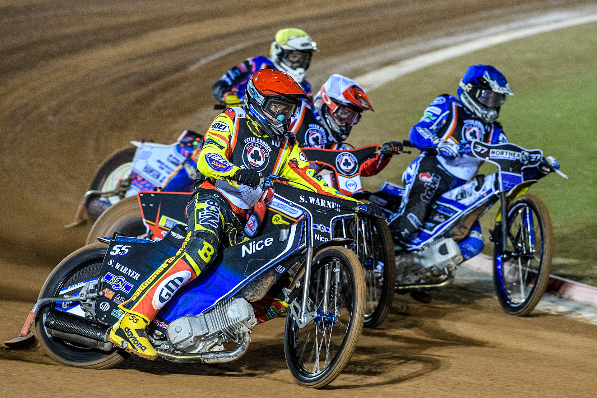 Matej Zagar in Red rides outside Zach Cook in White, Chris Harris \b with Niels-Kristian Iversen in Yellow behind during the Peter Craven Memorial Trophy at the National Speedway Stadium, Manchester on Monday 17th March 2025. (Photo: Ian Charles | MI News)