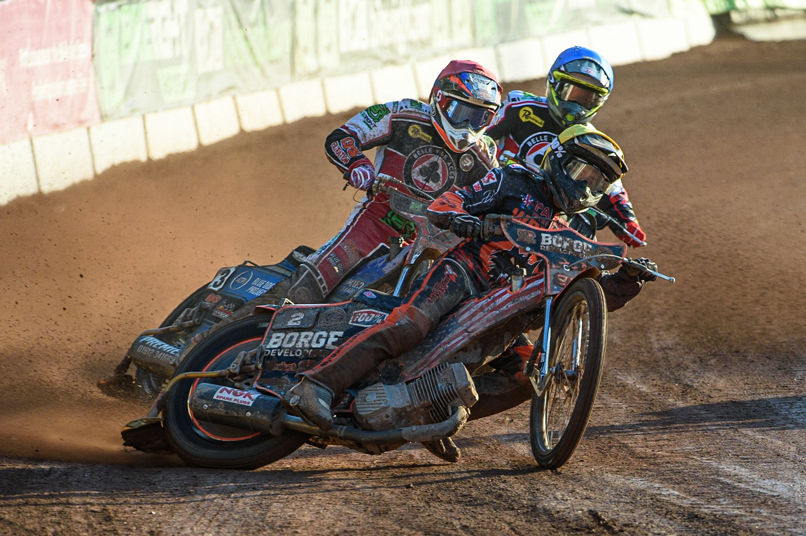 MANCHESTER, UK. JULY 15TH   Luke Becker  (Yellow) leads Steve Worrall  (Red) and Charles Wright  (Blue) during the SGB Premiership match between Belle Vue Aces and Wolverhampton Wolves at the National Speedway Stadium, Manchester on Thursday 15th July 2021. (Credit: Ian Charles | MI News)
