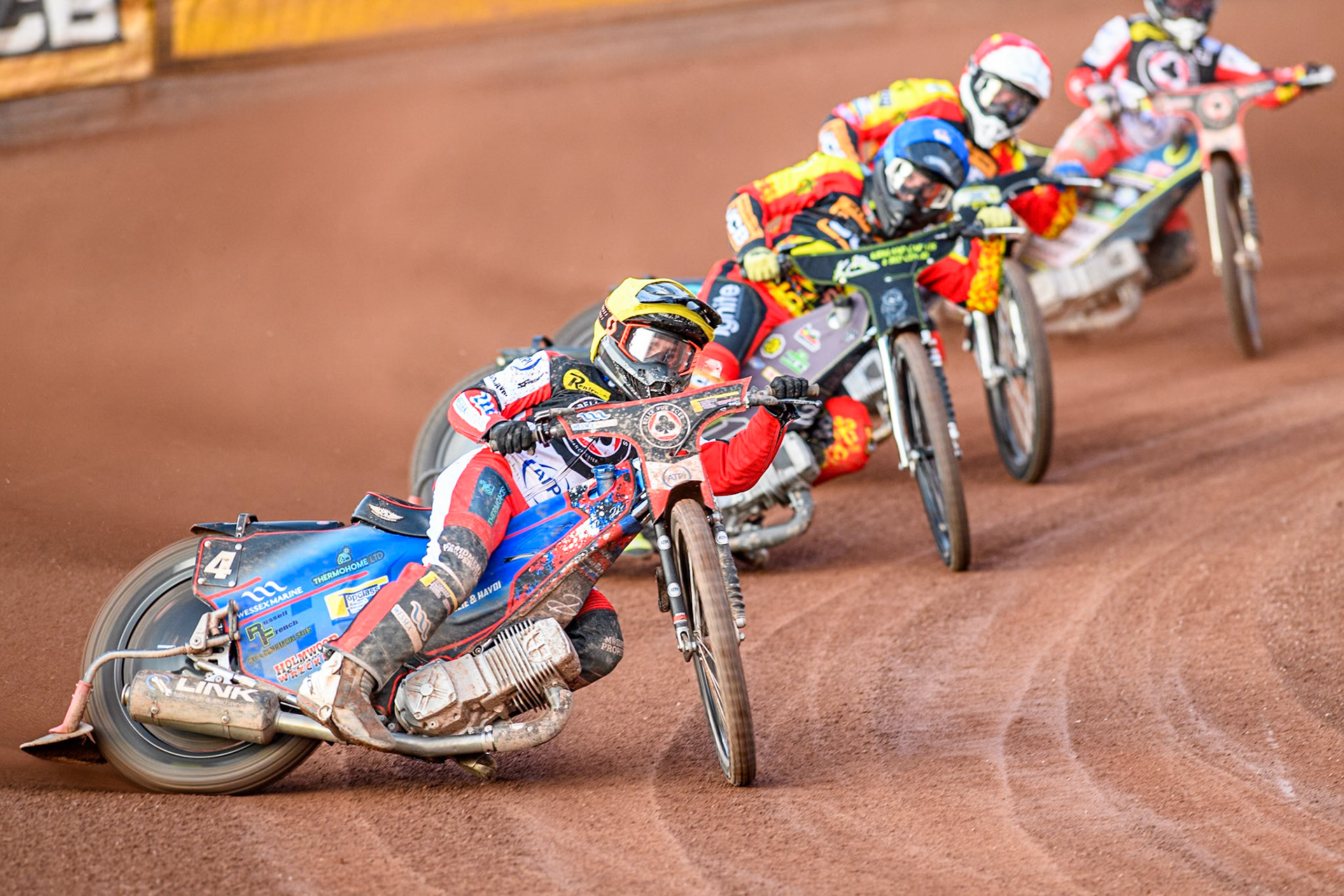 Belle Vue Aces' Ben Cook in Yellow leading Leicester Lions' Craig Cook in Blue, Leicester Lions' Ryan Douglas in Red and Belle Vue Aces' Jaimon Lidsey in Red during the Rowe Motor Oil Premiership match between Leicester Lions and Belle Vue Aces at the Pidcock Motorcycles Arena, Leicester on Thursday 25th July 2024. (Photo: Ian Charles | MI News)