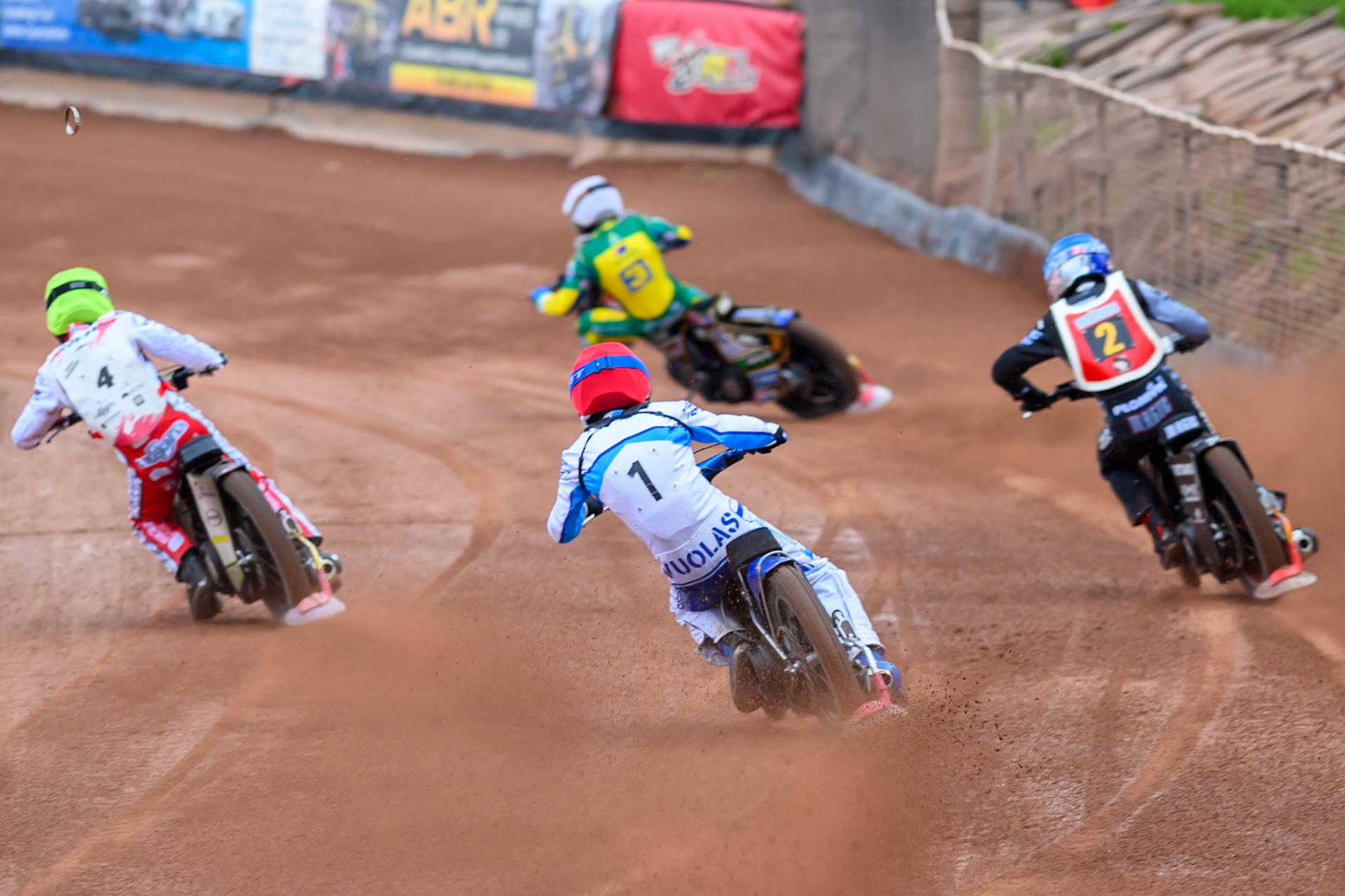 Antti Vuolas of Finland in Red chases Maciej Janowski of Poland in Blue, Jonas Knudsen of Denmark in Yellow and Jack Holder of Australia in White during the Speedway GP Qualifying Round 3 at Allied Ashfield Stadium, Glasgow on Saturday 30th May 2026. (Photo: Ian Charles | MI News)