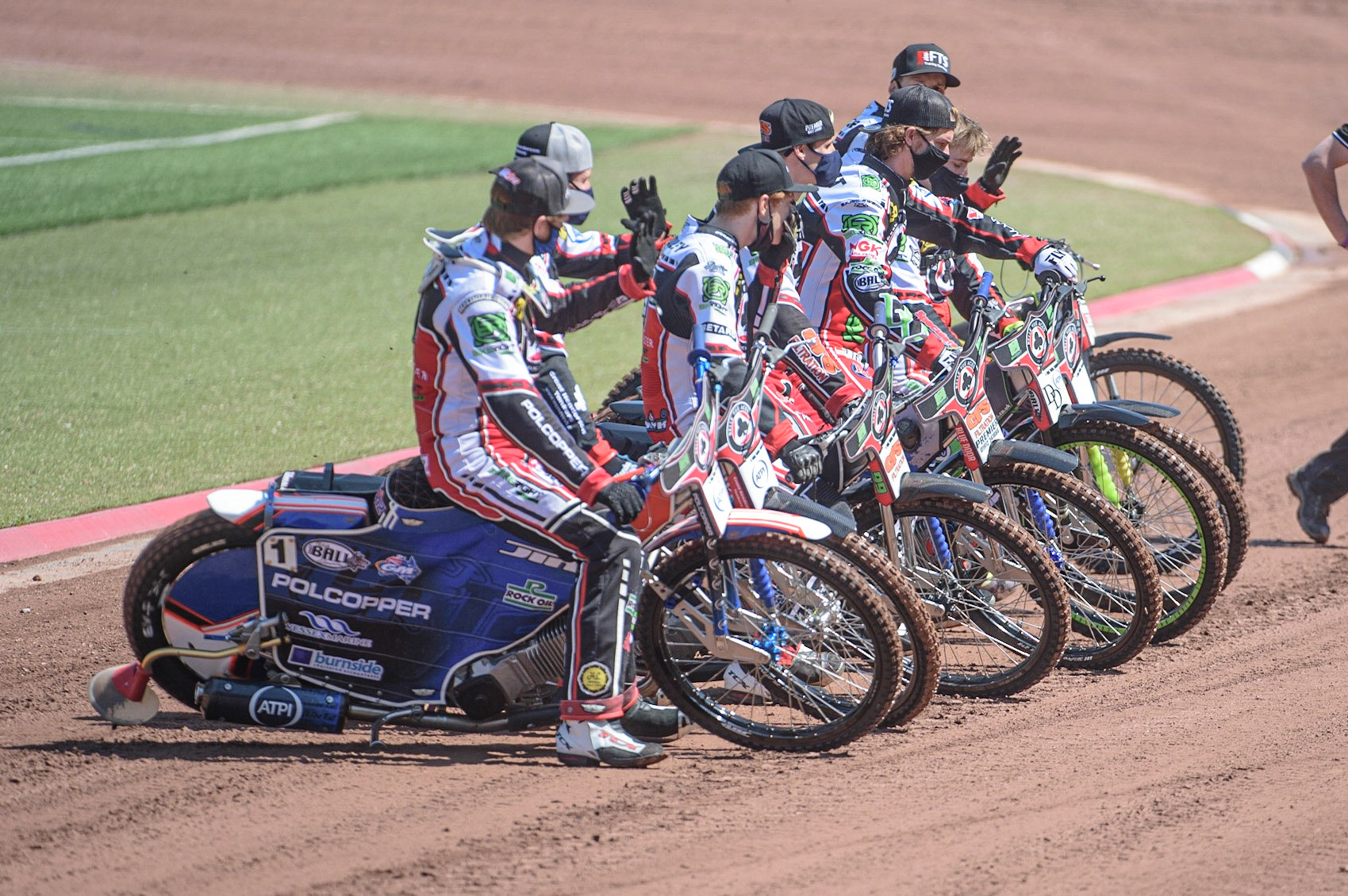 MANCHESTER, UK. MAY 31ST  The Belle Vue BikeRight Aces  line up on the pre match parade for the fans on the Back Straight during the SGB Premiership match between Belle Vue Aces and Peterborough at the National Speedway Stadium, Manchester on Monday 31st May 2021. (Credit: Ian Charles | MI News)