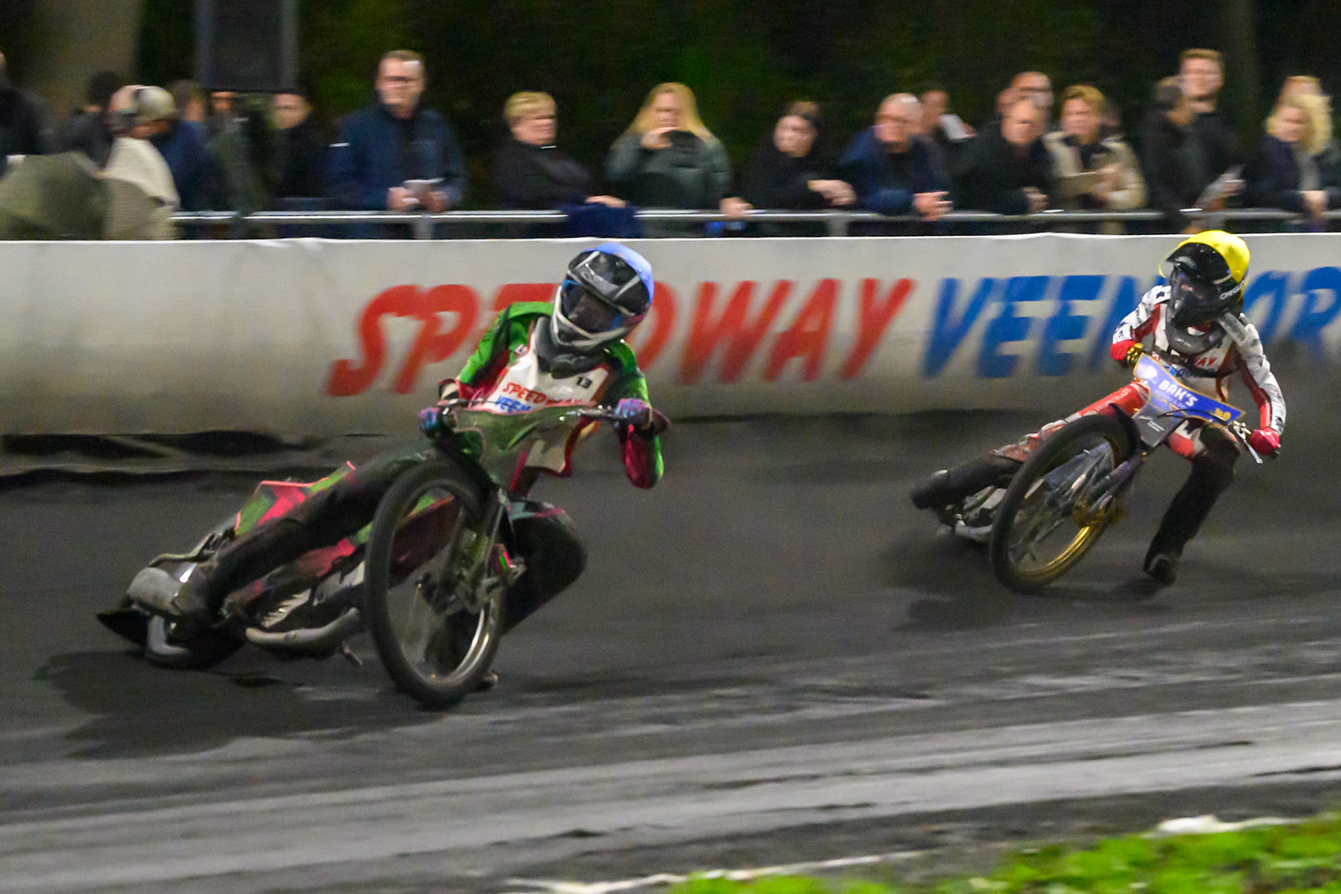 Zoltan Lovas of Hungary in Blue leading Jacob D. Jensen of Denmark in Yellow during the Gouden KENNY Helm at Speedway Veenoord, Veenoord in the Netherlands on Saturday 19th September 2026. (Photo: Ian Charles | MI News)