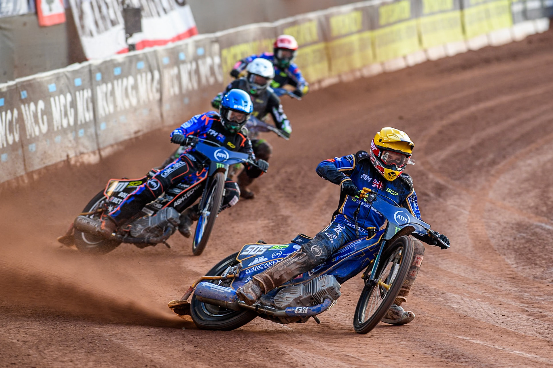 Robert Lambert (505) of Great Britain in Yellow leading Brady Kurtz (101) of Australia in Blue Wild Card Charles Wright (16) of Great Britain in White and Jason Doyle (69) of Australia in Red during the ATPI FIM Speedway Grand Prix Round 5 at the National Speedway Stadium, Manchester, on Saturday 14th June 2025. (Photo: Ian Charles | MI News)