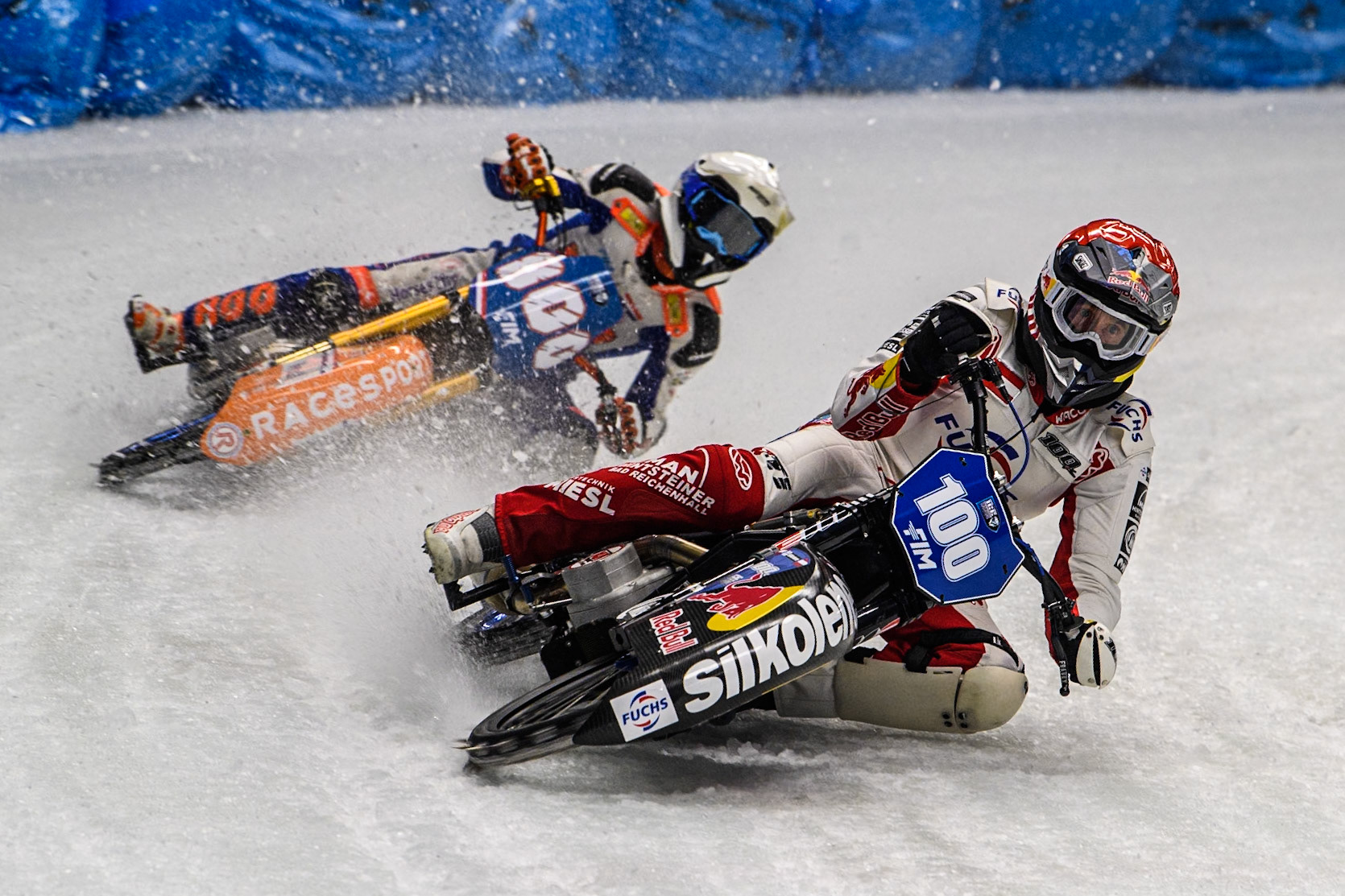 Franky Zorn (100) of Austria in Red leading Jasper Iwema (800) of The Netherlands in White during the Ice Speedway Gladiators World Championship Final 1 at Max-Aicher-Arena, Inzell on Saturday 15th March 2025. (Photo: Ian Charles | MI News)