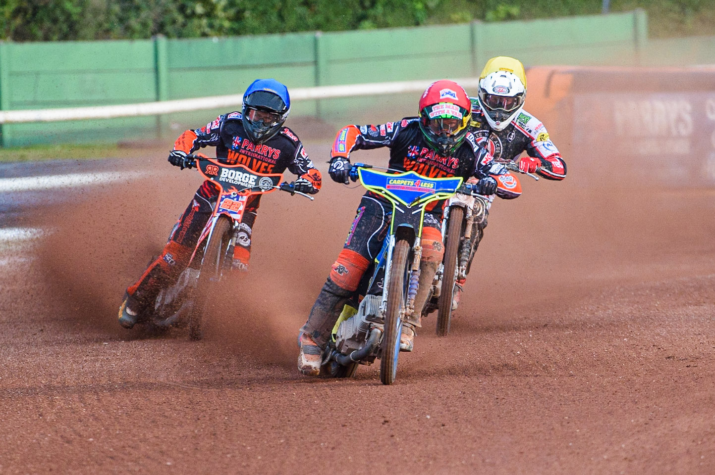 WOLVERHAMPTON, UK. JULY 26TH Nick Morris  (Red) leads Richie Worrall  (Yellow) and Luke Becker  (Blue) during the SGB Premiership match between Wolverhampton Wolves and Belle Vue Aces at the Ladbroke Stadium, Wolverhampton on Monday 26th July 2021. (Credit: Ian Charles | MI News)