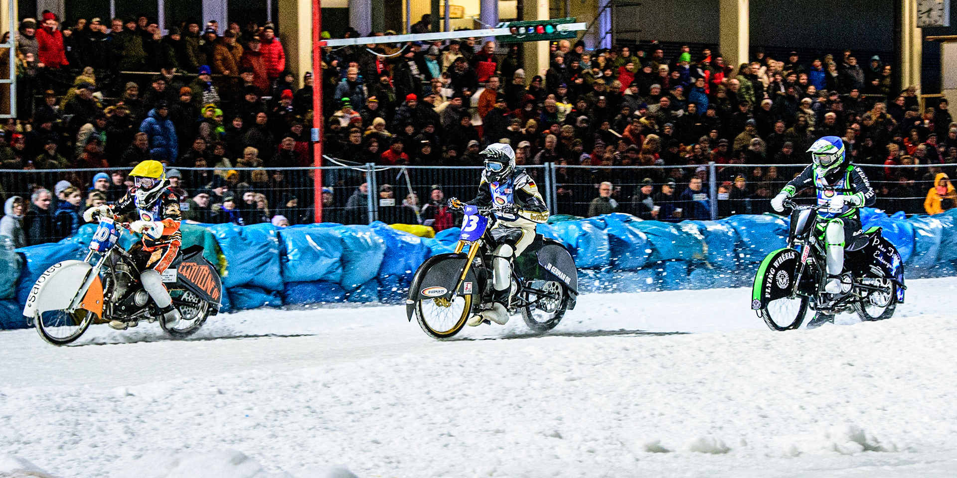 (l-r) Artturi Ervasti (Yellow), Franz Mayerbüchler (White) and Finn Loheider (Blue) during the German Individual Ice Speedway Championship at Horst-Dohm-Eisstadion, Berlin on Friday 3rd March 2023. (Photo: Ian Charles | MI News)