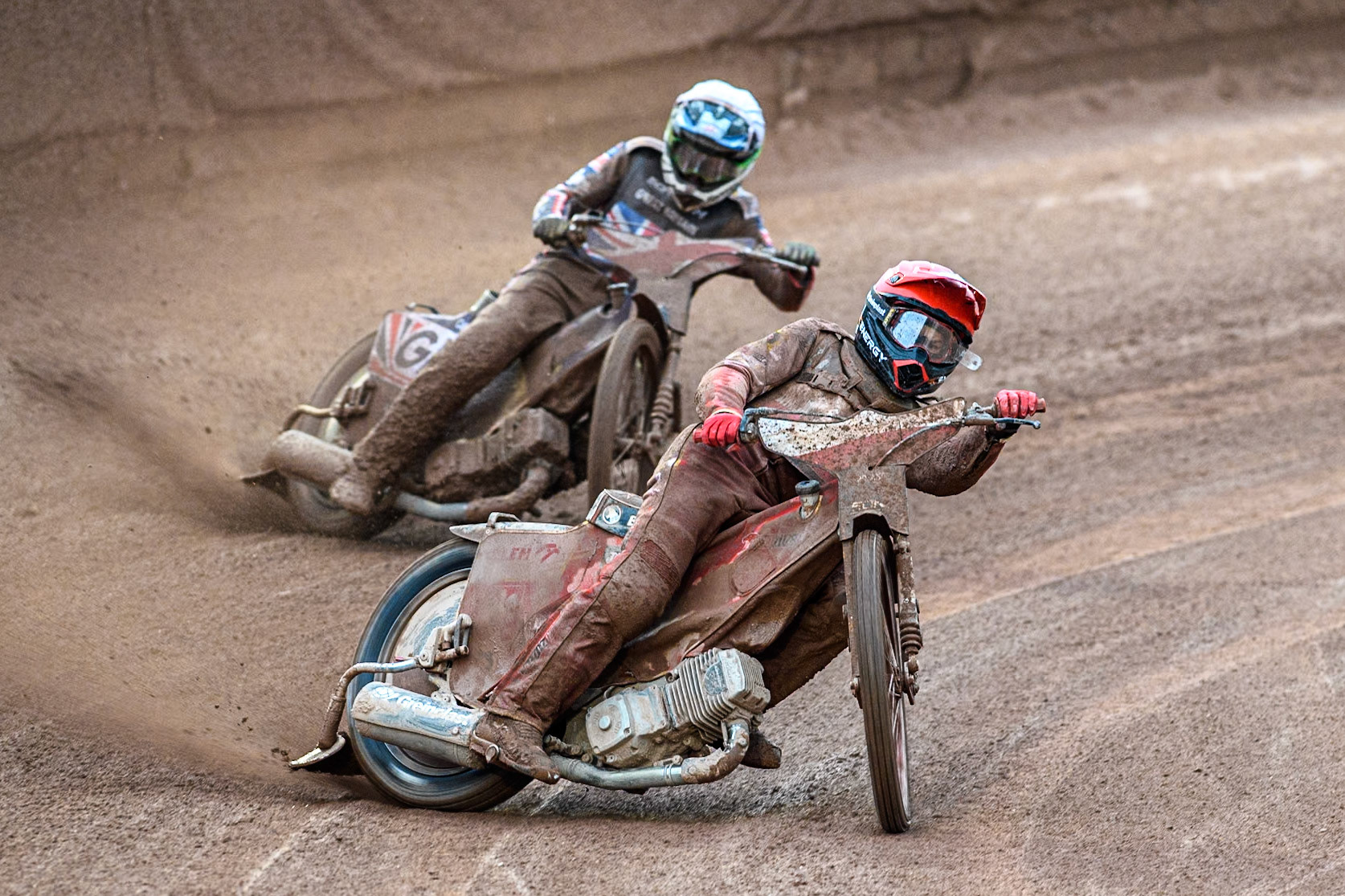 Bartosz Banbor of Poland in Red leading Leon Flint of Great Britain in White during the Monster Energy FIM Speedway of Nations 2 (Under 21) Final at the National Speedway Stadium, Manchester on Friday 12th July 2024. (Photo: Ian Charles | MI News)