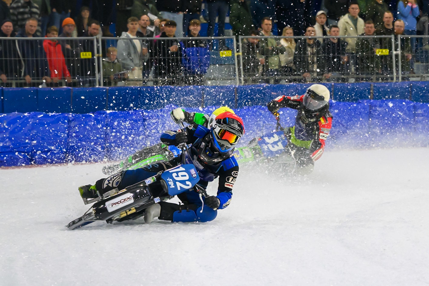 Niclas Svensson (192) of Sweden  in Red leading Andrej Divis (107) of Czechia in Yellow and Johann Weber (33) of Germany  in White during the FIM Ice Speedway Gladiators World Championship Final 3 at Ice Rink Thialf, Heerenveen on Saturday 11th April 2026. (Photo: Ian Charles | MI News)