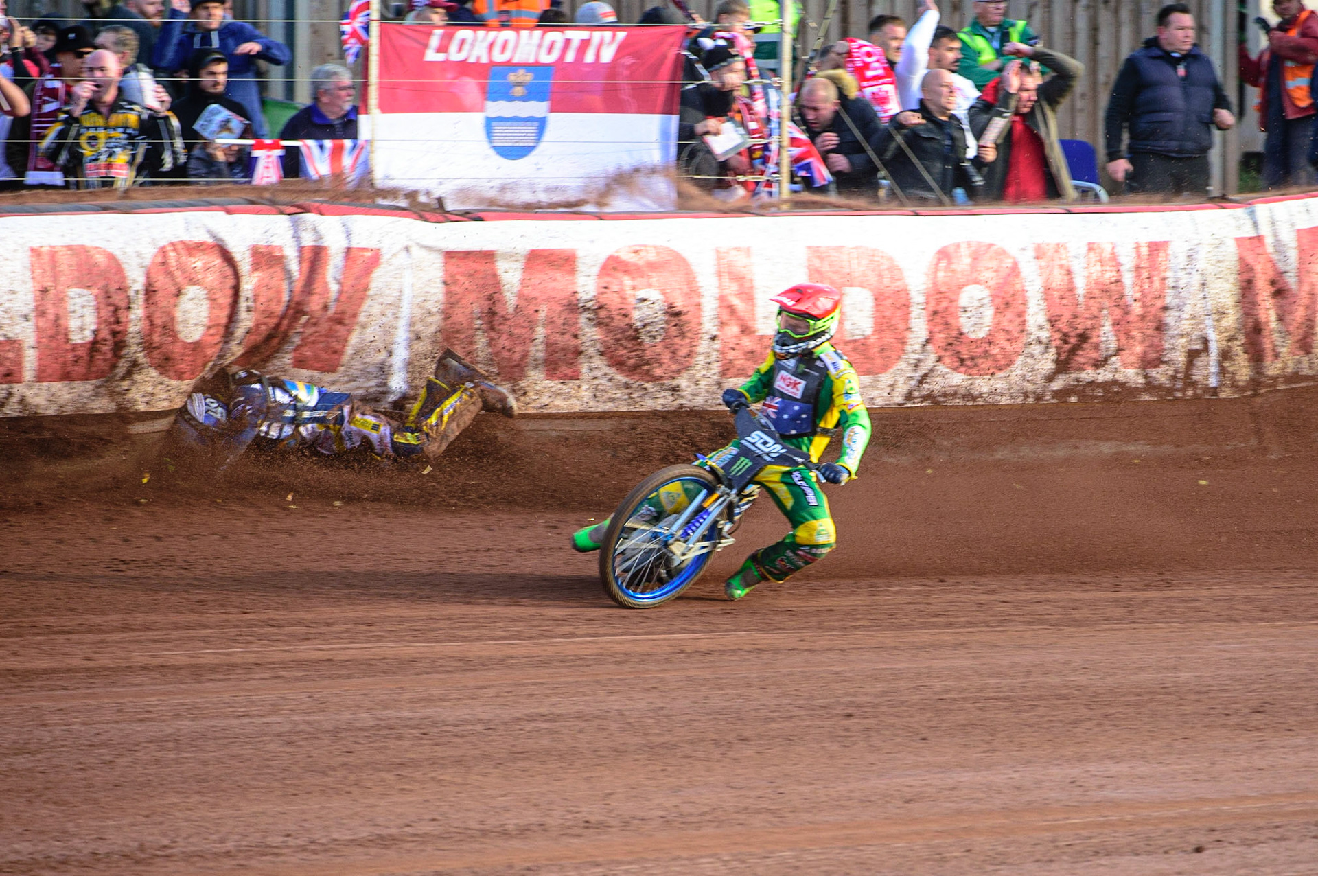 MANCHESTER, UK. OCT 16TH Pontus Aspgren of Sweden (White) slides off as Jacob Thorsell of Sweden hits the airfence during the Monster Energy FIM Speedway of Nations at the National Speedway Stadium, Manchester on Saturday  16th October 2021. (Credit: Ian Charles | MI News)