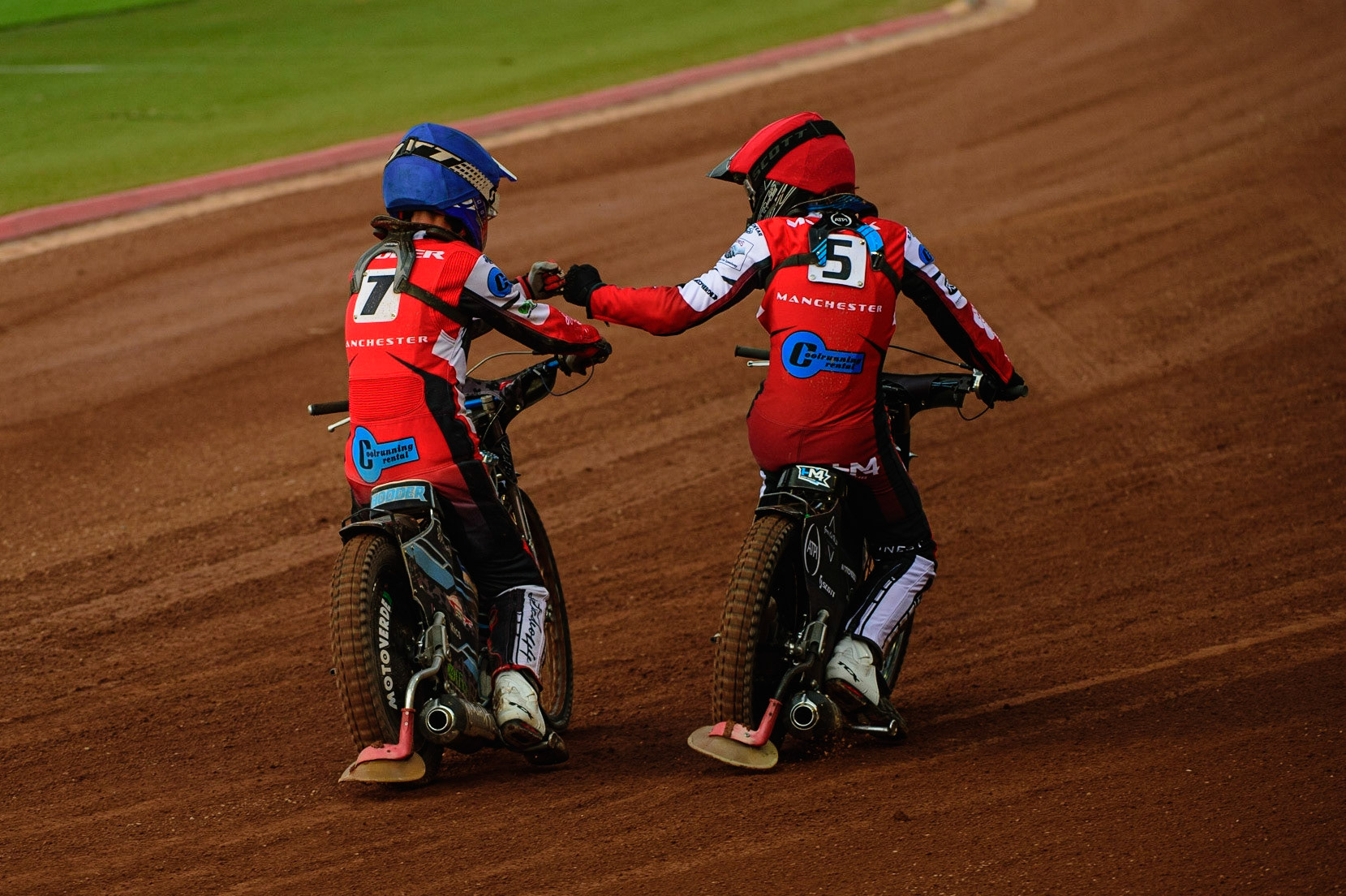 Freddy Hodder  (Blue) and Harry McGurk  celebrate their heat win with maximum points during the National Development League match between Belle Vue Colts and Mildenhall Fens Tigers at the National Speedway Stadium, Manchester on Friday 15th July 2022. (Credit: Ian Charles | MI News)