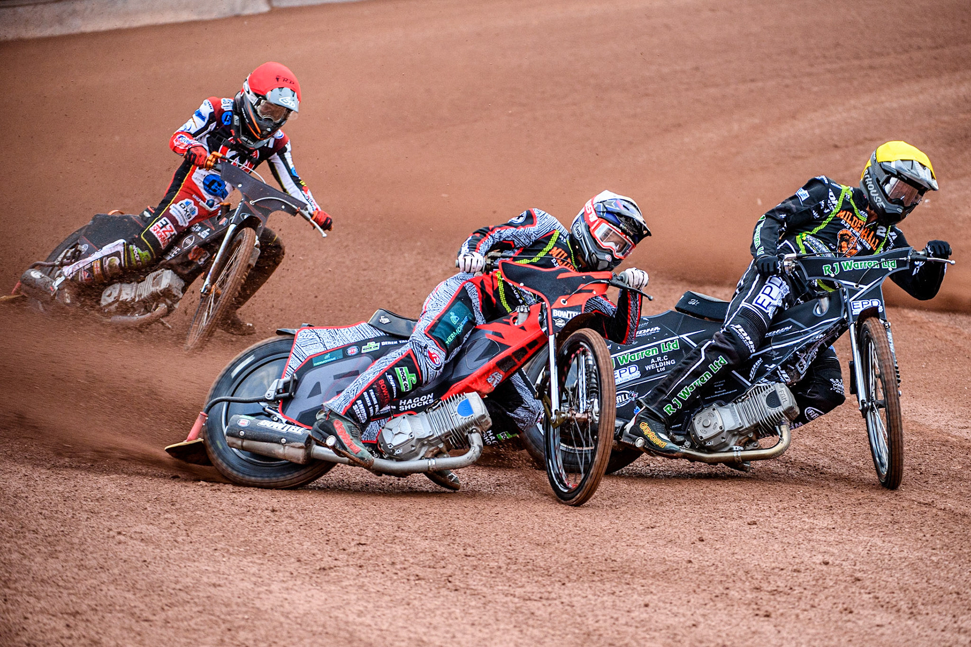 Alfie Bowtell (White) outside Josh Warren (Yellow) with Jack Smith (Red) behind during the National Development League match between Belle Vue Colts and Mildenhall Fens Tigers at the National Speedway Stadium, Manchester on Friday 26th May 2023. (Photo: Ian Charles | MI News)