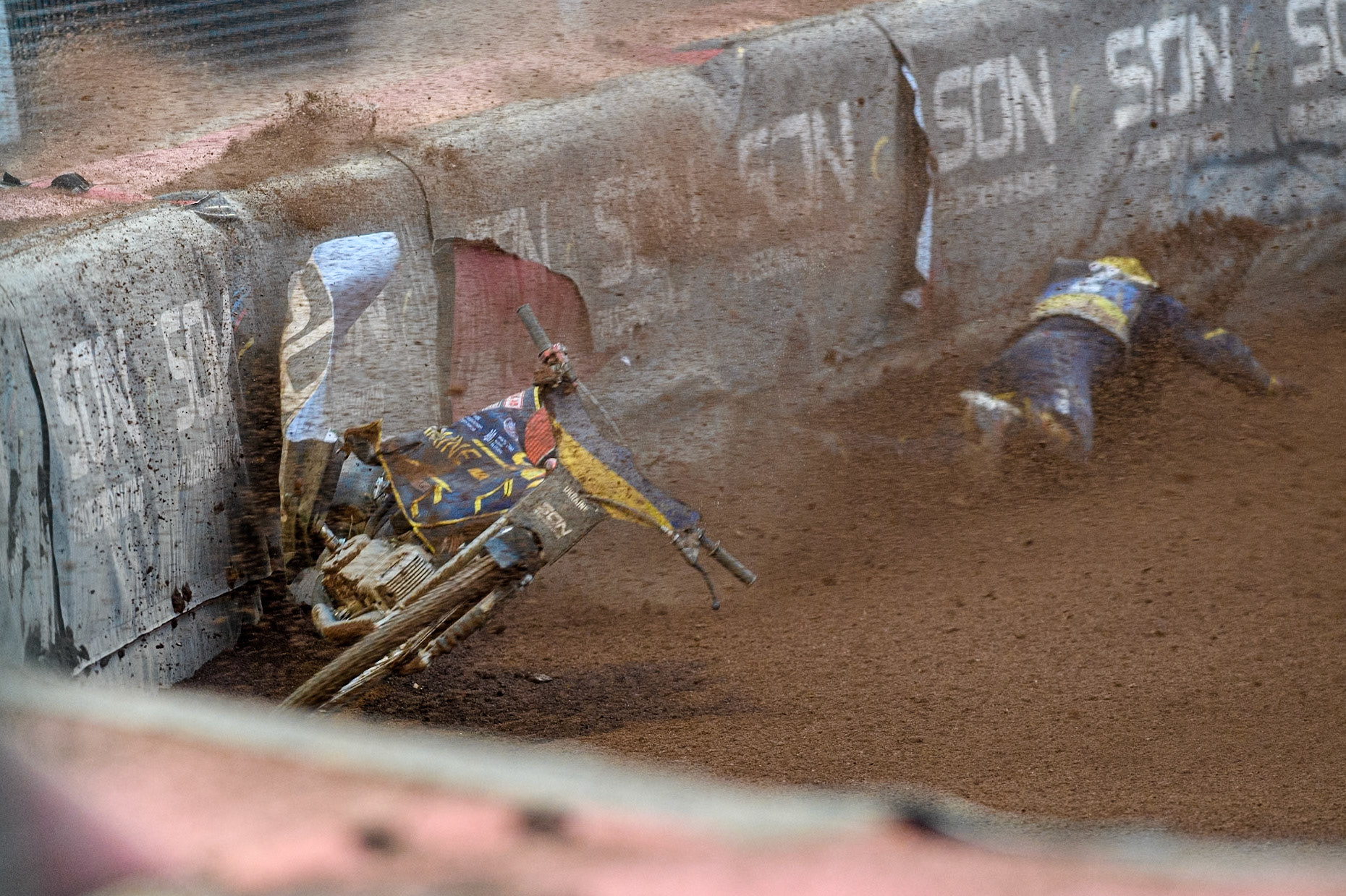 Marko Levishyn of Ukraine in Yellow crashes out of his final heat during the Monster Energy FIM Speedway of Nations Semi-Final 1 at the National Speedway Stadium, Manchester on Tuesday 9th July 2024. (Photo: Ian Charles | MI News)