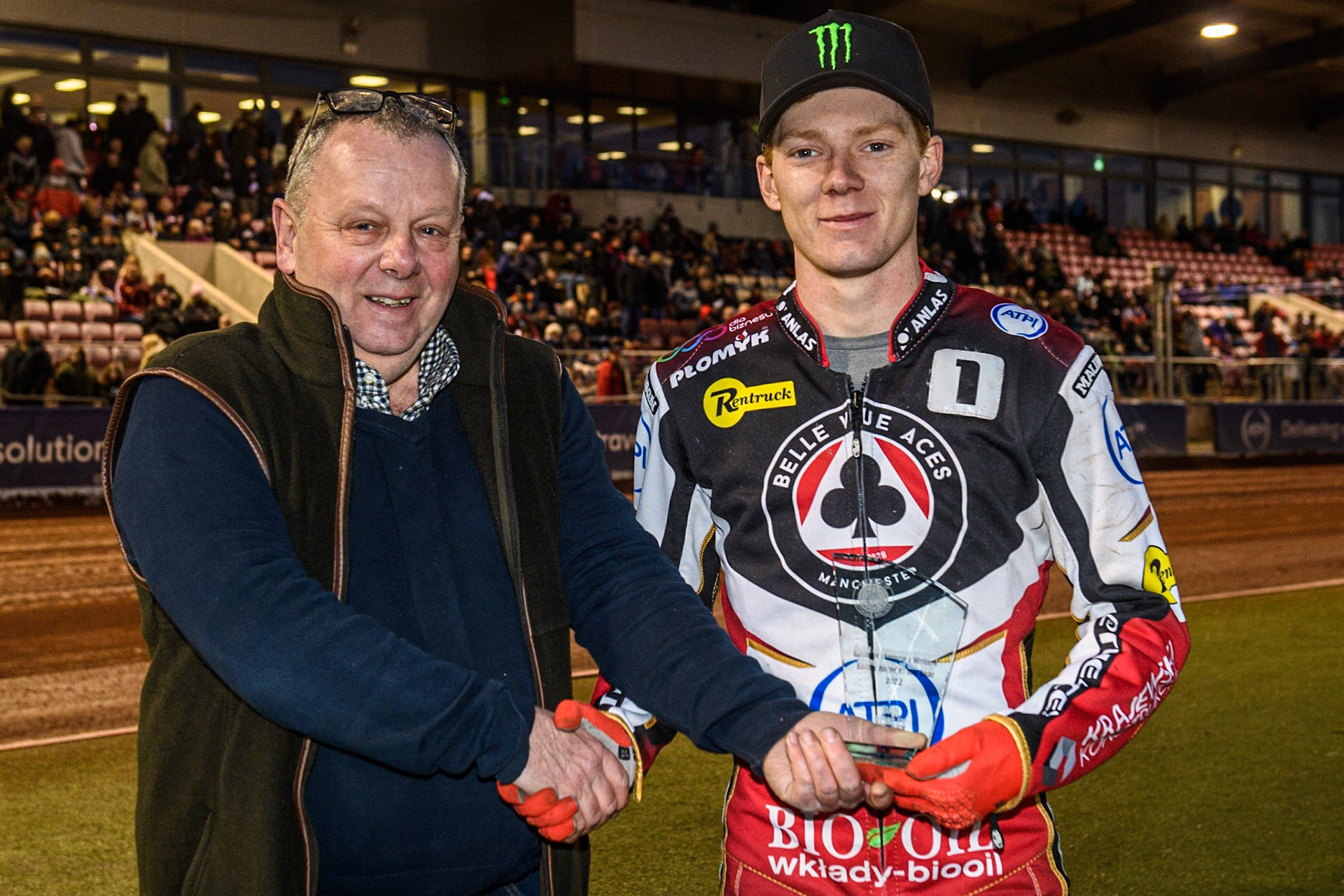 Richard Netherwood (left) of the Guild of Motoring Writers presents Dan Bewley with his award as Young Rider of the Year during the SGB Premiership match between Belle Vue Aces and Peterborough at the National Speedway Stadium, Manchester on Monday 24th April 2023. (Photo: Ian Charles | MI News)