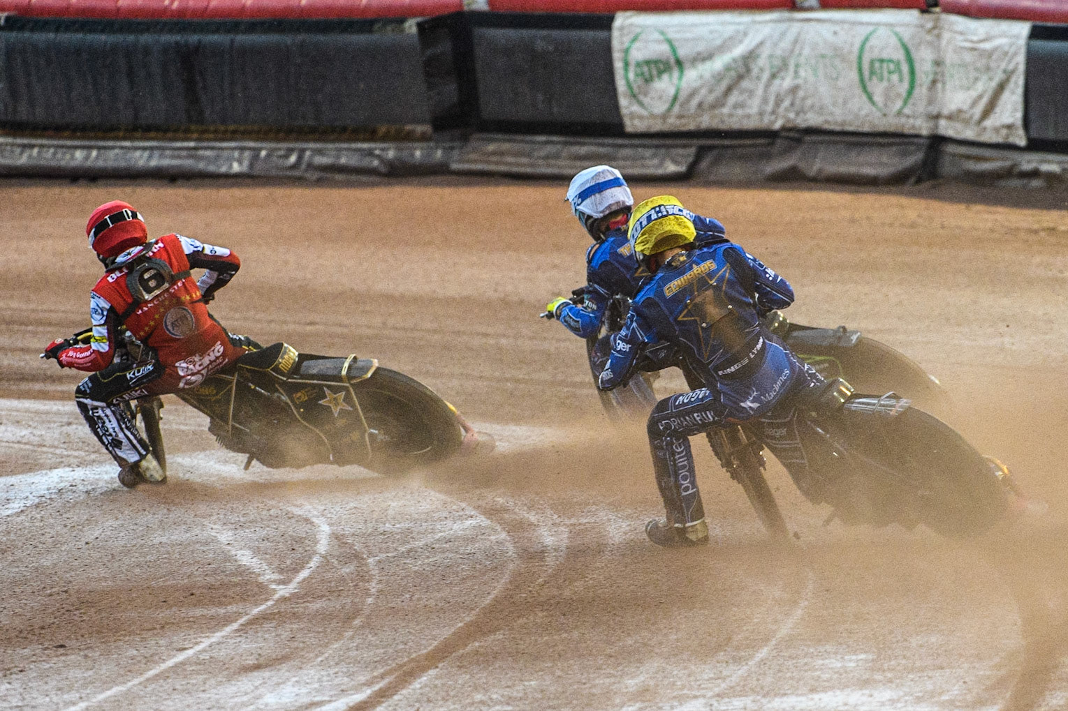 Jason Edwards (Yellow) chases Kye Thomson (White) and Norick Blodorn (Red) during the Sports Insure Premiership match between Belle Vue Aces and King's Lynn Stars at the National Speedway Stadium, Manchester on Monday 12th June 2023. (Photo: Ian Charles | MI News)