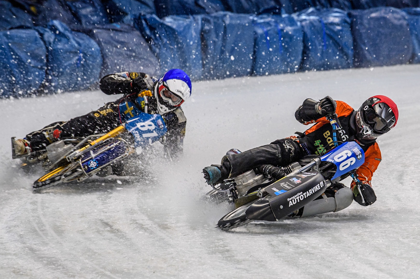 Finland's Aki Ala-Riihimäki (66) (Red) leads  Sweden"s Jimmy Olsén (81) (Blue)during the FIM Ice Speedway Gladiators World Championship Final 2 at the Max-Aicher-Arena, Inzell on Sunday 24 March 2024. (Photo: Ian Charles | MI News)