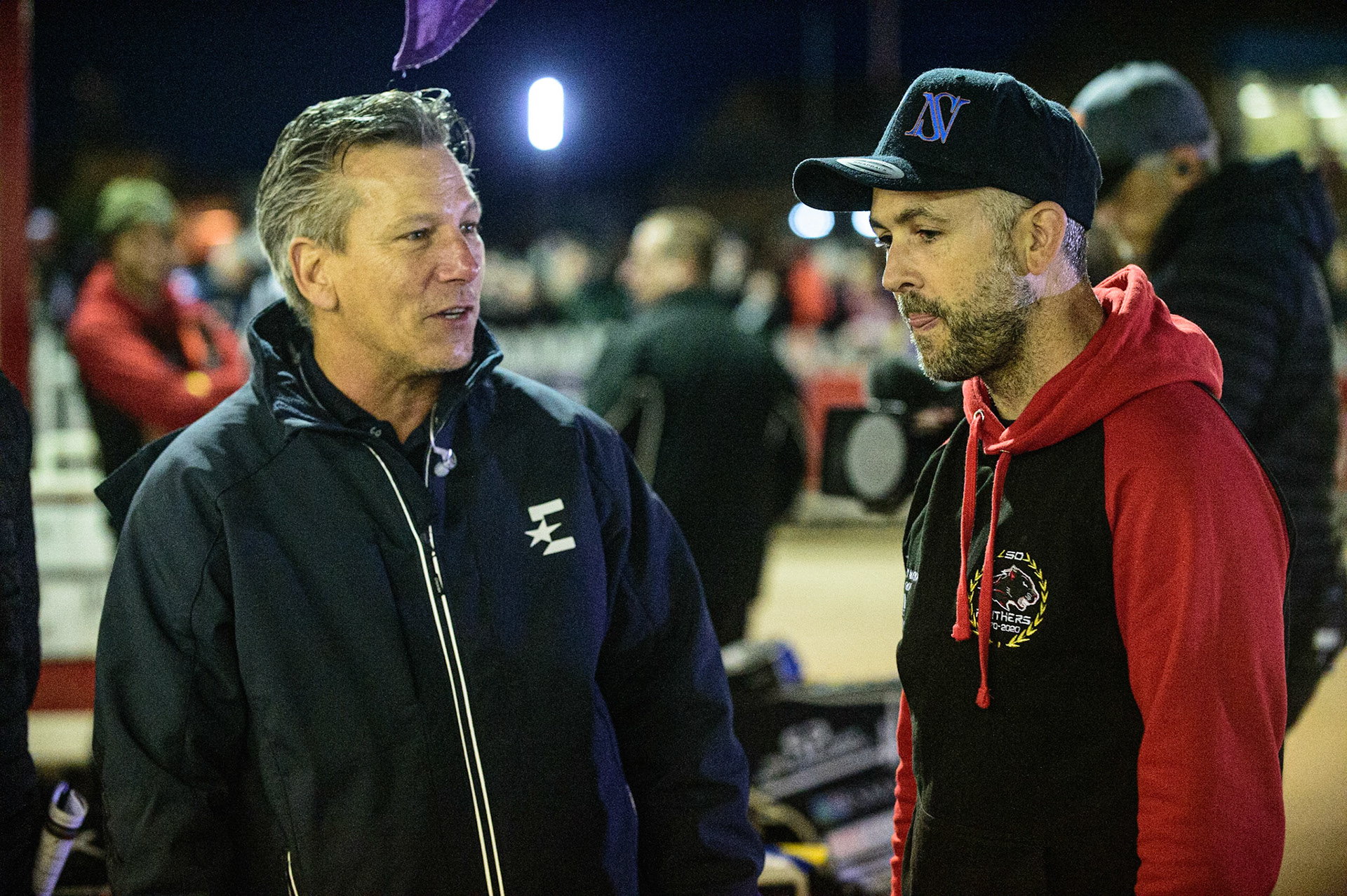 PETERBOROUGH, UK. OCT 14TH Scott Nicholls  (right) with former World Champion Sam Ermolenko during the SGB Premiership Grand Final 2nd leg between Peterborough and Belle Vue Aces at East of England Showground, Peterborough on Thursday 14th October 2021. (Credit: Ian Charles | MI News)