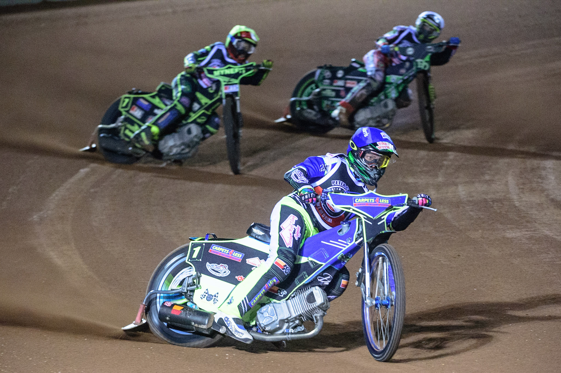 MANCHESTER, UK. OCT 23RD  Nick Morris  (Blue) leads Jye Etheridge  (Yellow) and Charles Wright  (White) during the Peter Craven Memorial Trophy event at the National Speedway Stadium, Manchester on Saturday 23rd October 2021. (Credit: Ian Charles | MI News)
