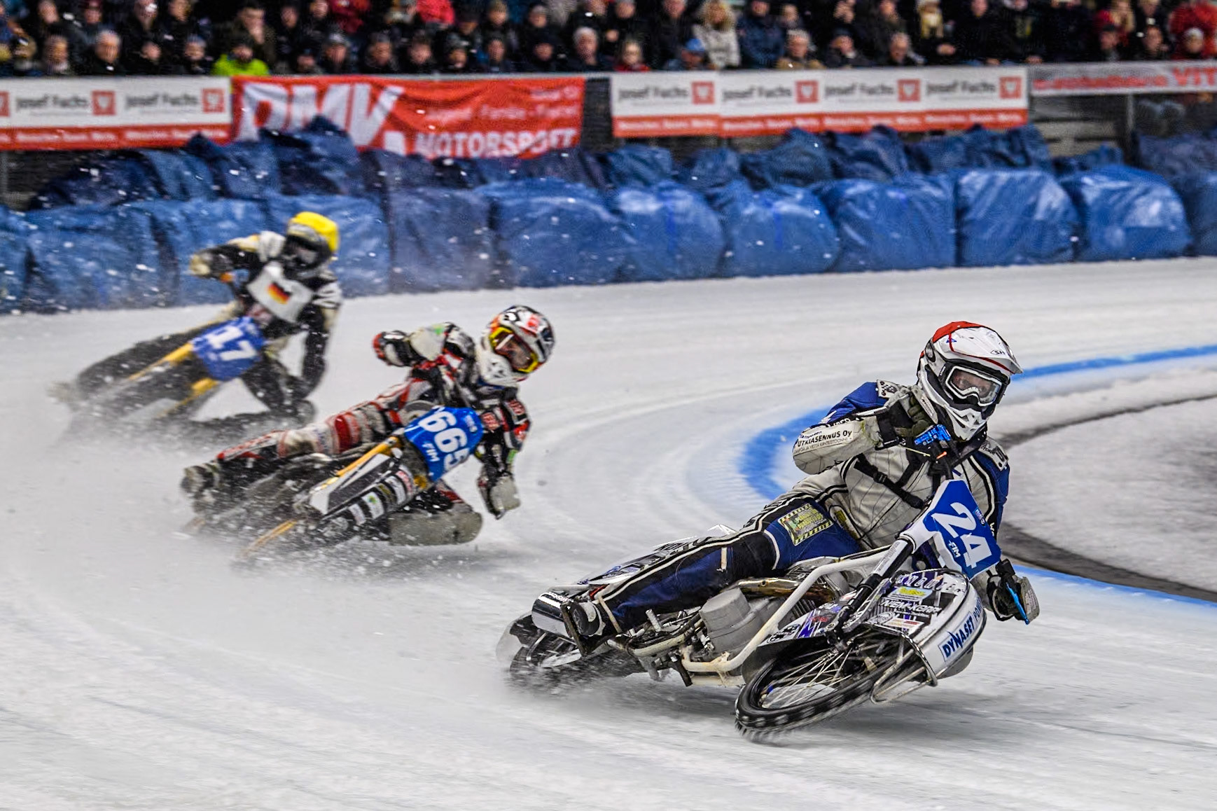 Finland's Max Koivula (24)  (Red) leads  Austria's Charly Ebner (665) (Blue) and Germany's Franz Mayerbüchler (17) (Yellow) during the FIM Ice Speedway Gladiators World Championship Final 2 at the Max-Aicher-Arena, Inzell on Sunday 24 March 2024. (Photo: Ian Charles | MI News)