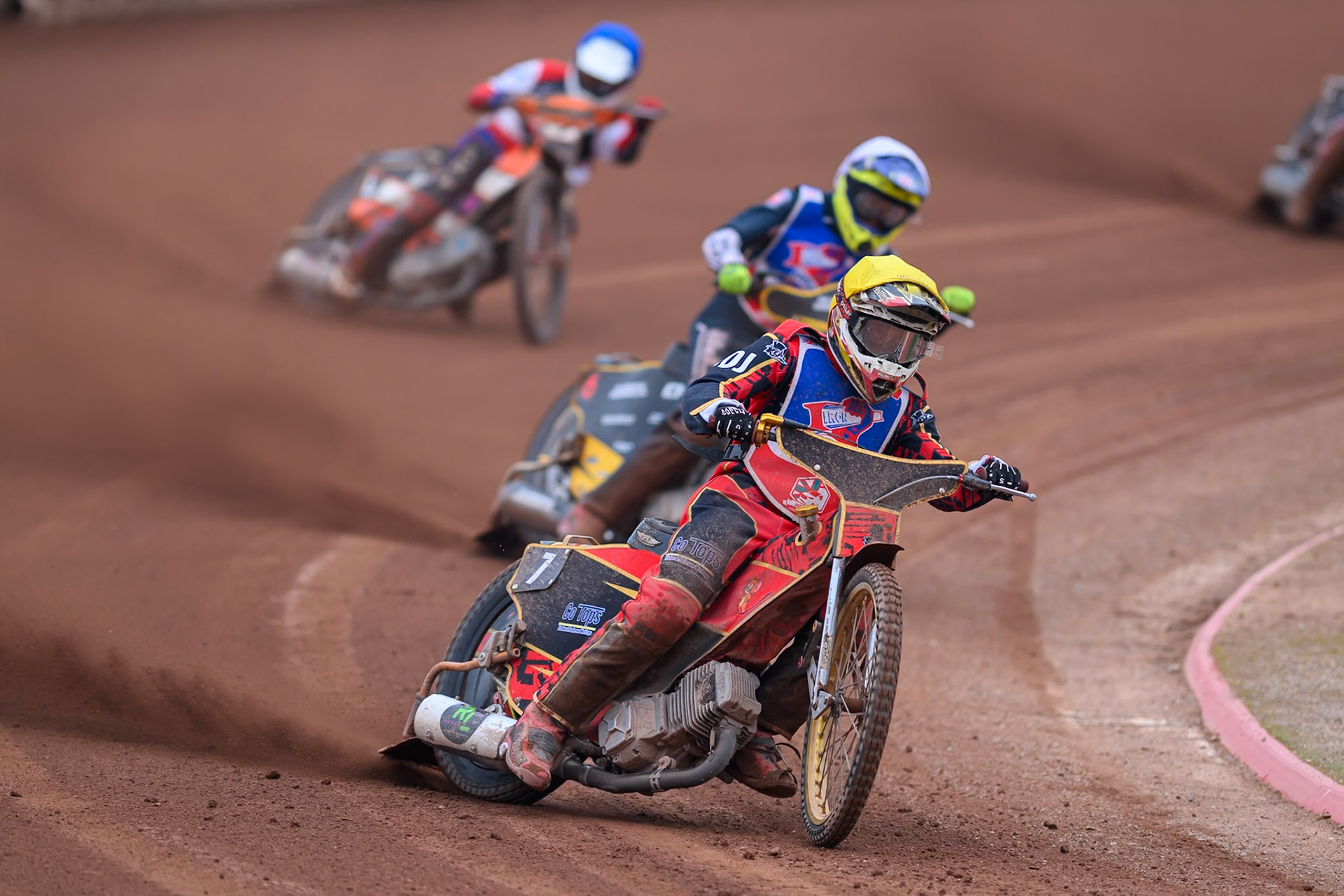 Steelers' Luke Harris. in Yellow leading Steelers' Vinnie Foord in White and Belle Vue Colts' Harry Fletcher in Blue during the WSRA National Development League match between Belle Vue Colts and Sheffield/Scunthorpe Steelers at the National Speedway Stadium, Manchester on Sunday 12th October 2025. (Photo: Ian Charles | MI News)