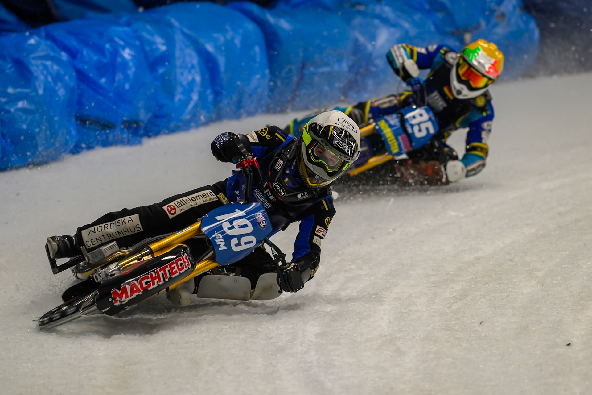 Martin Haarahiltunen (199) of Sweden  in White leading Luca Bauer (85) of Italy/Germany in Yellow during the Ice Speedway Gladiators World Championship Final 2 at Max-Aicher-Arena, Inzell on Sunday 15th March 2026. (Photo: Ian Charles | MI News)