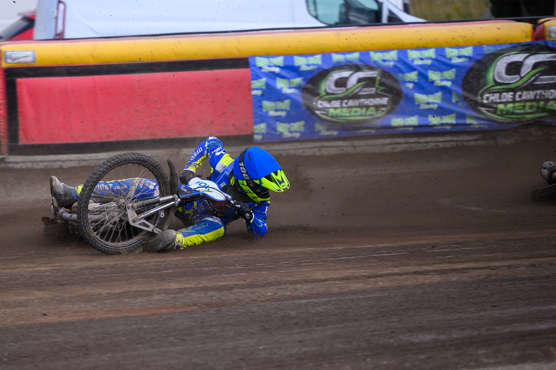 Will Boraston of Buxton Bulls in Yellow falls in the path of Ollie Binns of Kings Lynn Young Stars during the WSRA National Development League match between Buxton Bulls and King's Lynn Young Stars at Hi-Edge Speedway, Buxton on Sunday 9th August 2026. (Photo: Ian Charles | MI News)
