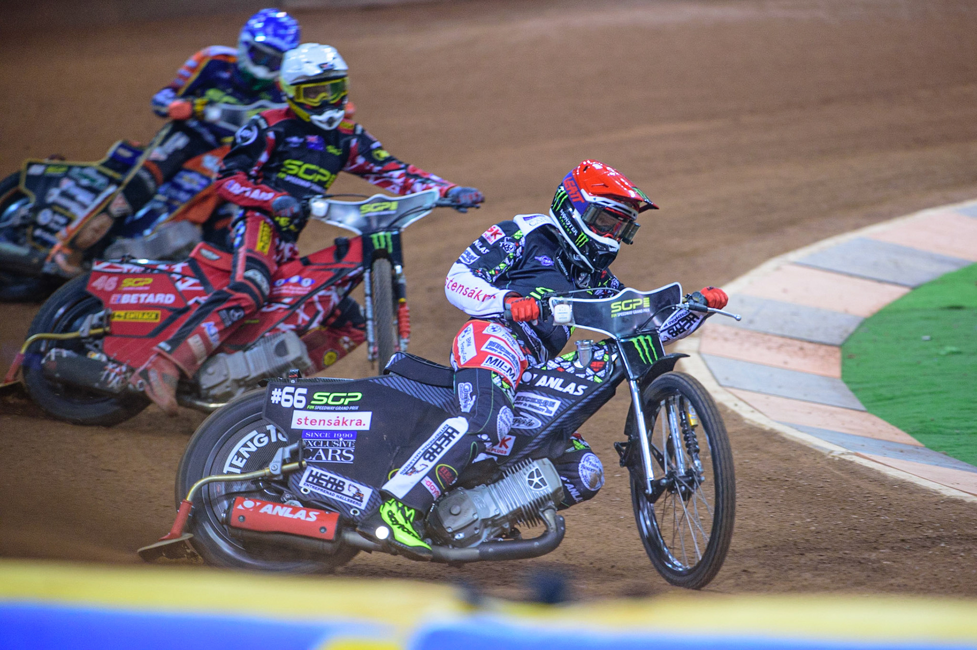 Fredrik Lindgren (66) (Red) leads Max Fricke (46)(White) and Mikkel Michelsen (155) (Blue) during the FIM  Speedway Grand Prix of Great Britain at the Principality Stadium, Cardiff on Saturday 13th August 2022. (Credit: Ian Charles | MI News