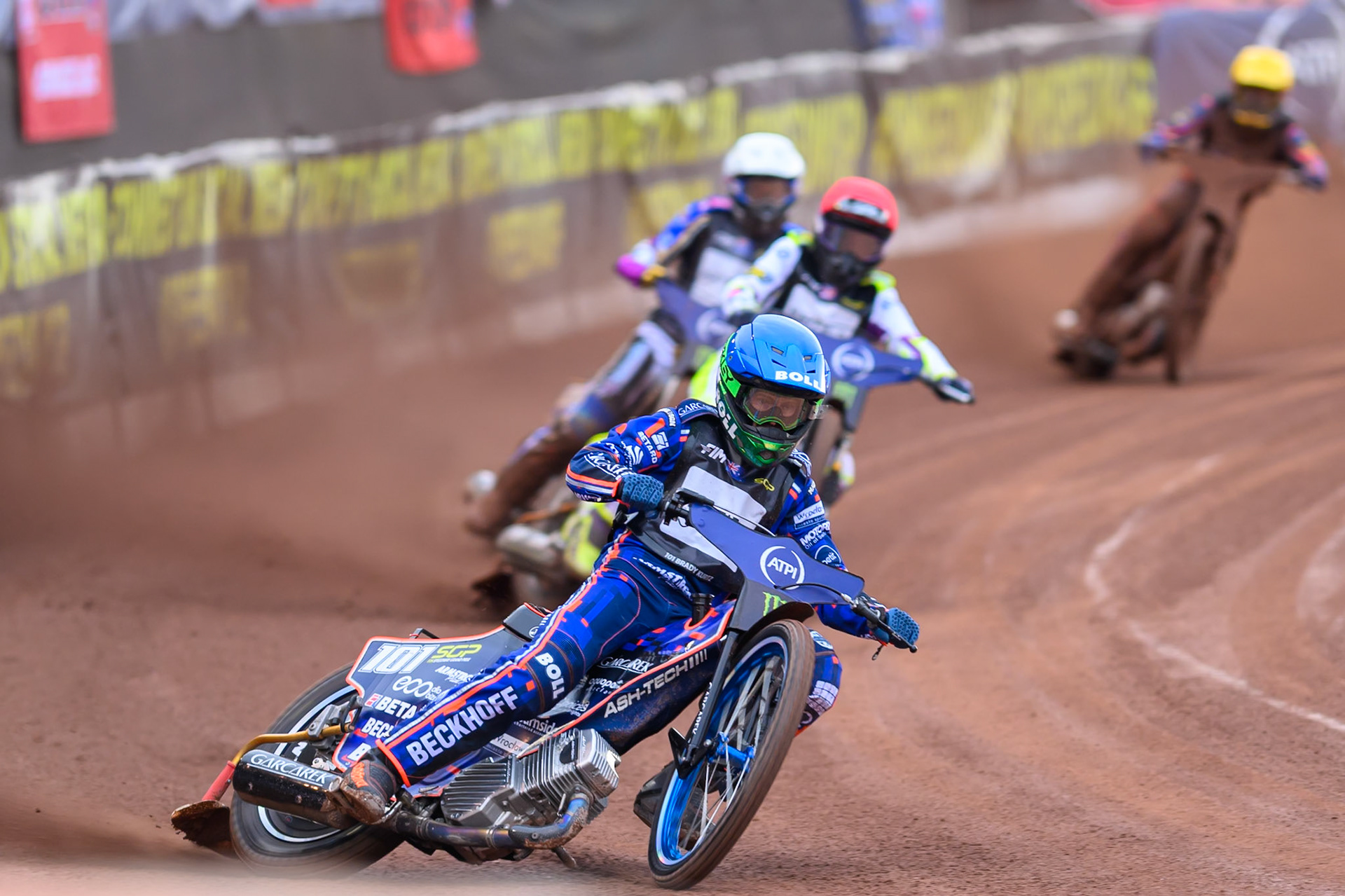 Brady Kurtz (101) of Australia in Blue leading Wild Card Tom Brennan (16) of Great Britain in Red Jason Doyle (69) of Australia in White and Andzejs Lebedevs (29) of Latvia in Yellow during the ATPI  FIM Speedway GP of Manchester at the National Speedway Stadium, Manchester on Saturday 6th June 2026. (Photo: Ian Charles | MI News)