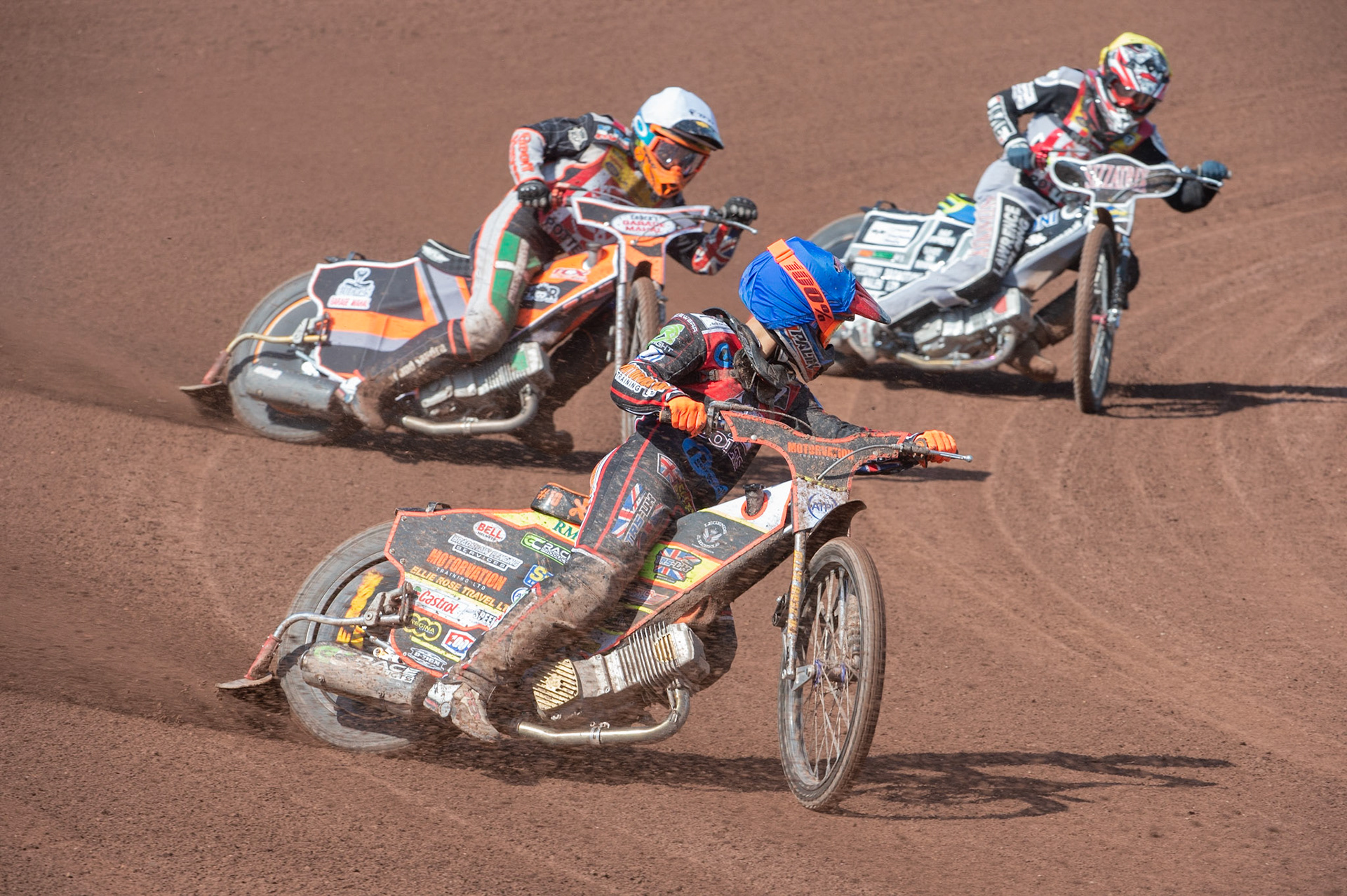 Photo: Ian Charles

Belle Vue Colts’ Jordan Palin looks back to see where the Stoke Potters Connor Coles (White) and Joe Alcock (Yellow) are

Belle Vue Colts v Stoke Potters, National League, Belle Vue National Speedway Stadium, Manchester, Friday 19  April  2019