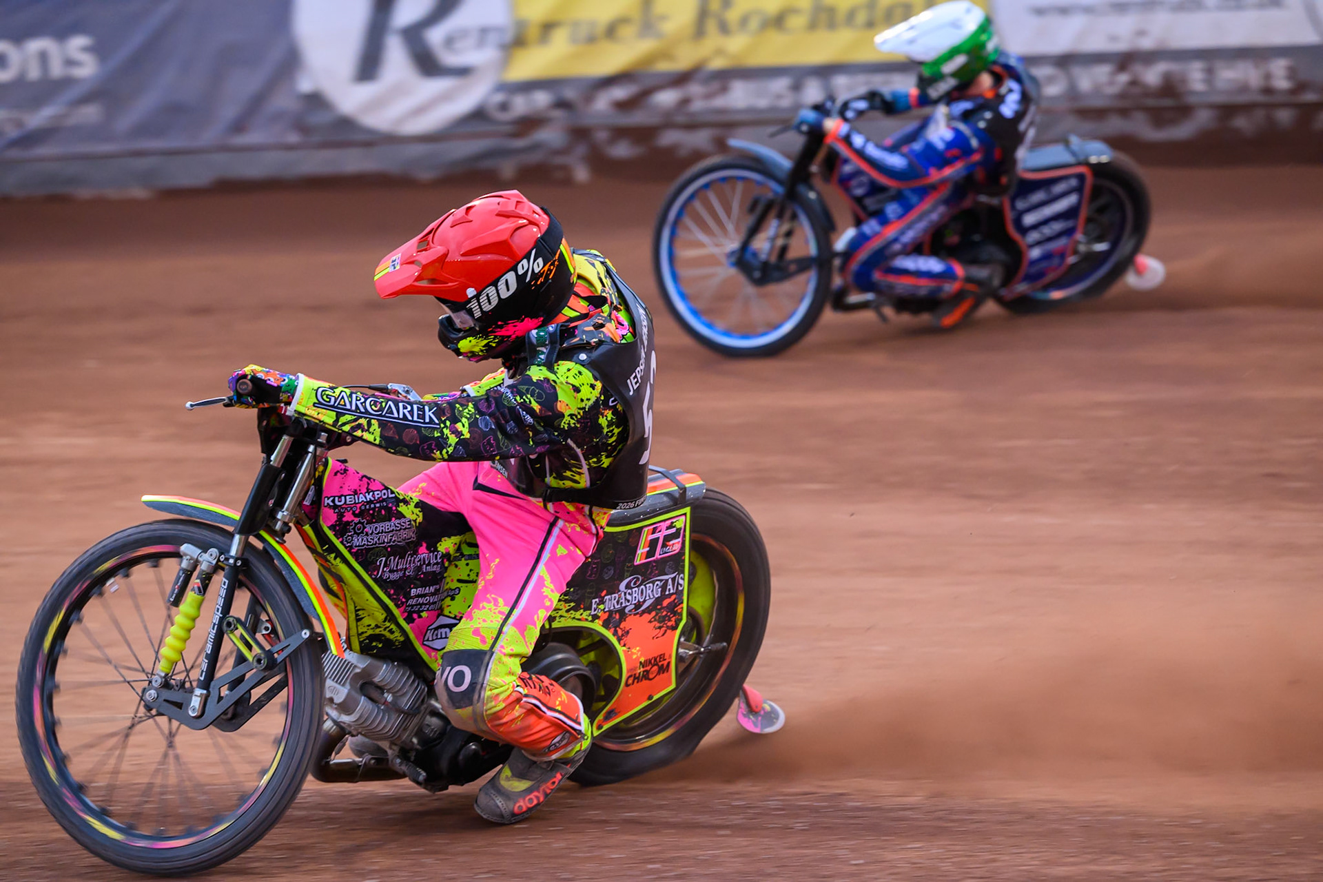 Michael Jepsen Jensen (52) of Denmark in Red rides inside  Brady Kurtz (101) of Australia in White during the ATPI  FIM Speedway GP of Manchester at the National Speedway Stadium, Manchester on Friday 5th June 2026. (Photo: Ian Charles | MI News)