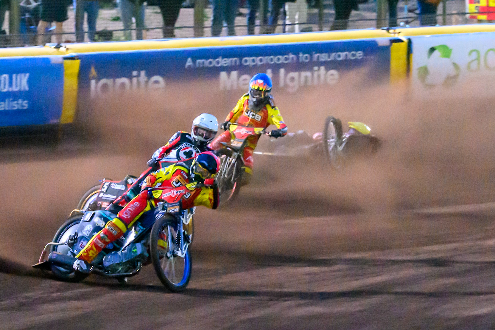 Ryan Douglas of Leicester Lions in Red leading Jason Doyle of Belle Vue Aces  in White  and Drew Kemp of Leicester Lions in Blue  as Tate Zischke of Belle Vue Aces  in Yellow  falls behind them during the Rowe Motor Oil Premiership match between Leicester Lions and Belle Vue Aces at the Hydroscan Arena, Leicester on Monday 7th September 2026. (Photo: Ian Charles | MI News)