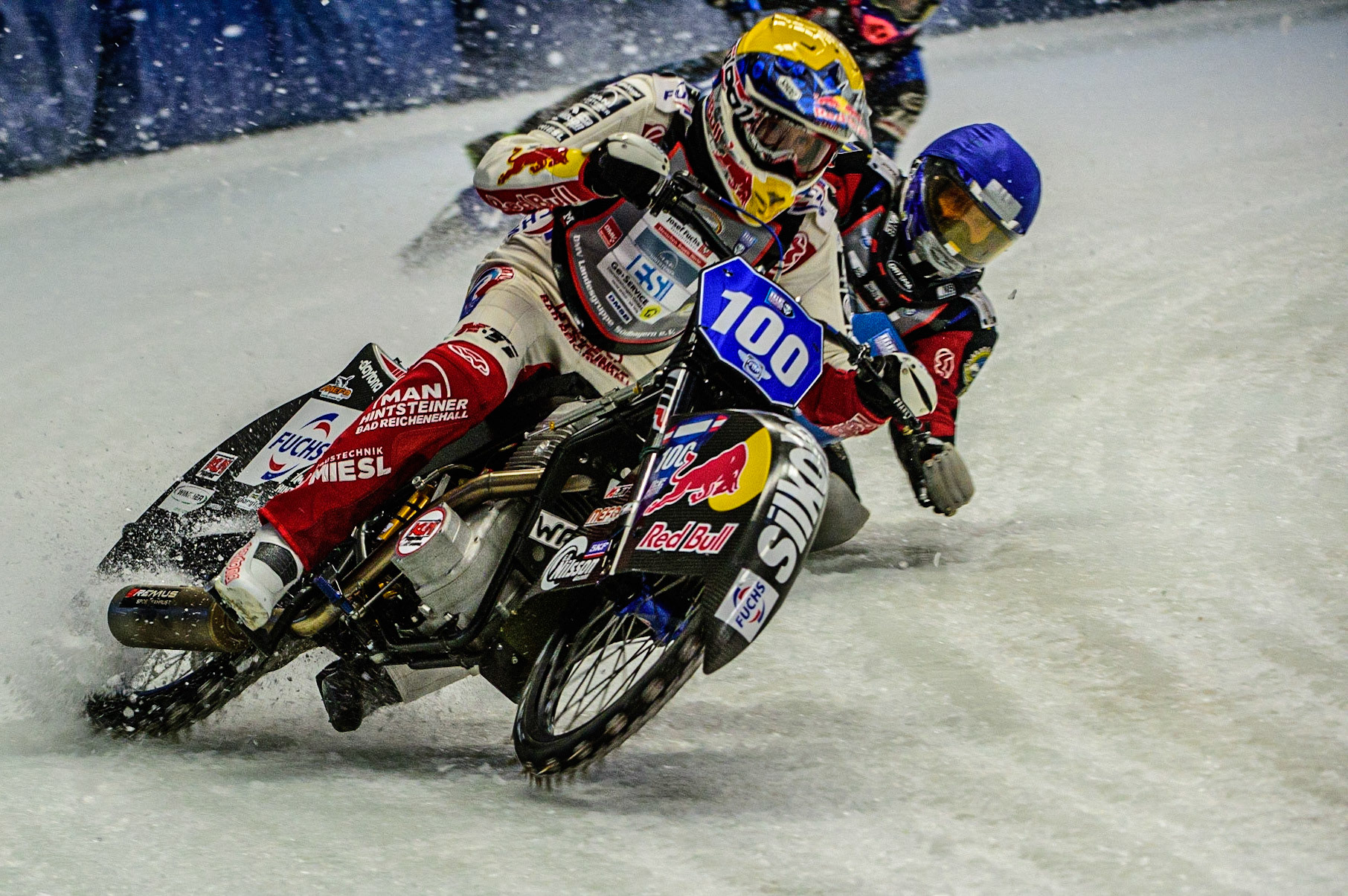 Franz Zorn (100) (Yellow) picks up outside Stefan Svensson (58) during the Ice Speedway Gladiators World Championship Final 1 at Max-Aicher-Arena, Inzell, Germany on Saturday 18th March 2023. (Photo: Ian Charles | MI News)