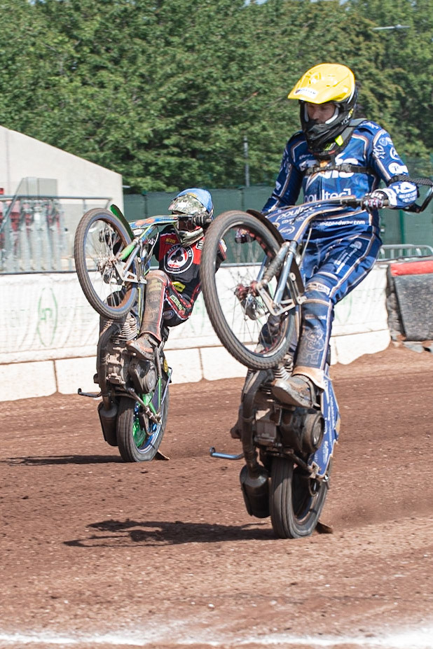 Photo: Ian Charles

Craig Cook  and Dan Bewley  wheelie up the home straight 

Belle Vue Aces v Kings Lynn Stars, British Speedway Premiership, Belle Vue National Speedway Stadium, Manchester, Monday 26  August  2019