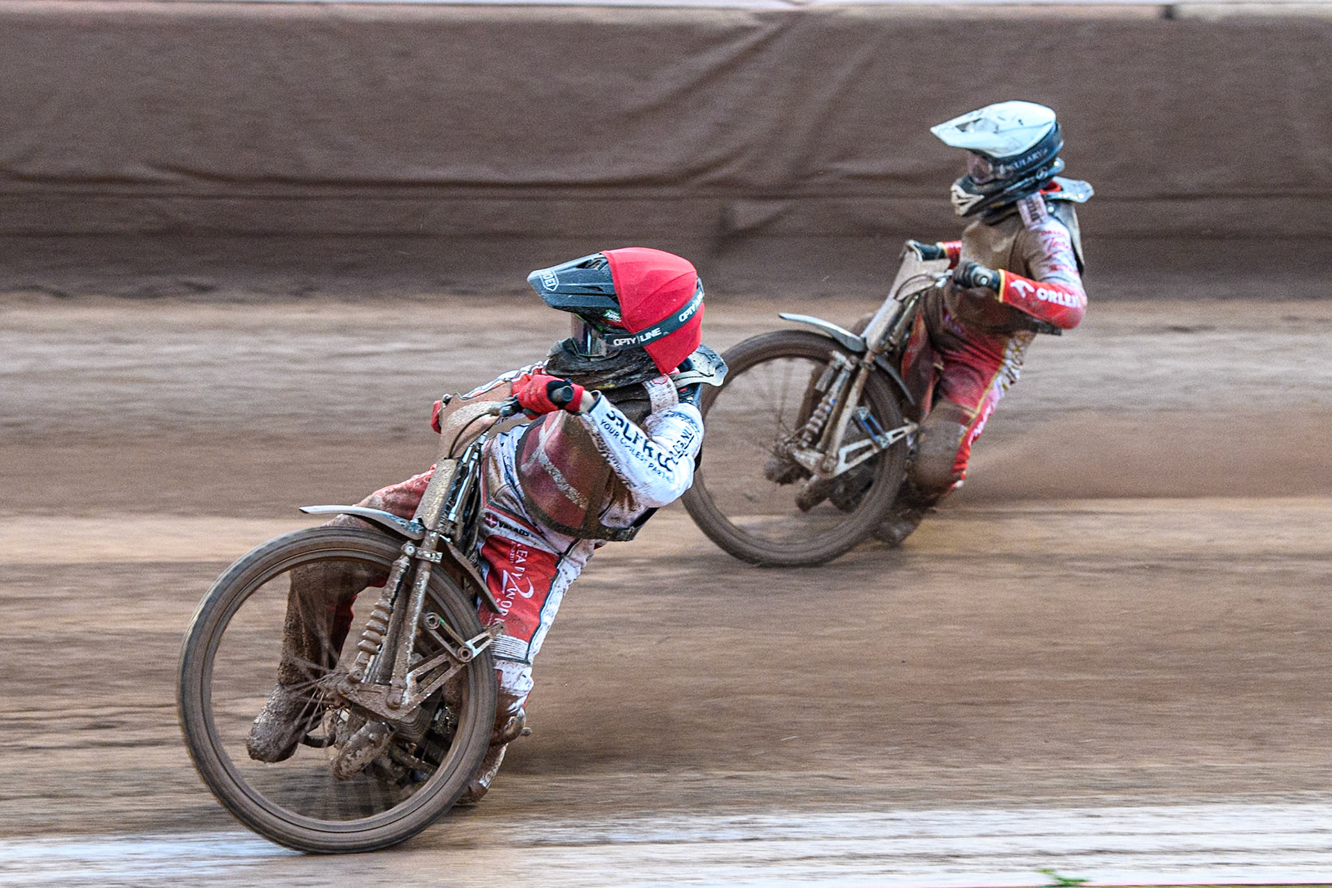 Villads Nagel of Denmark in Red rides inside Wiktor Przyjemski of Poland in White during the Monster Energy FIM Speedway of Nations 2 (Under 21) Final at the National Speedway Stadium, Manchester on Friday 12th July 2024. (Photo: Ian Charles | MI News)