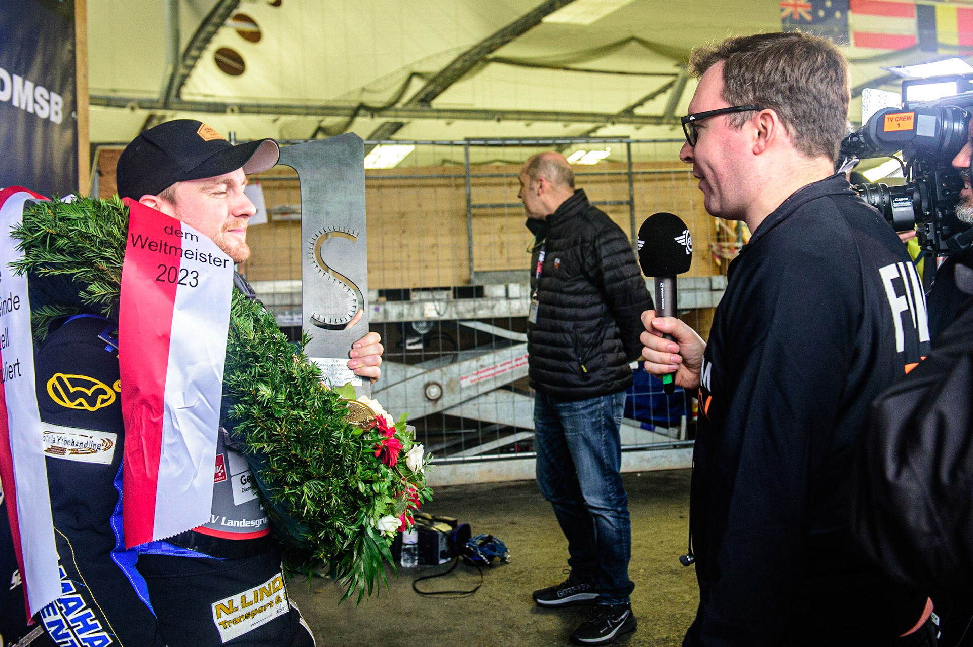 World Ice Speedway Champion Martin Haarahiltunen is interview by Alex Raby for FIM TV during the Ice Speedway Gladiators World Championship Final 2 at Max-Aicher-Arena, Inzell, Germany on Sunday 19th March 2023. (Photo: Ian Charles | MI News)