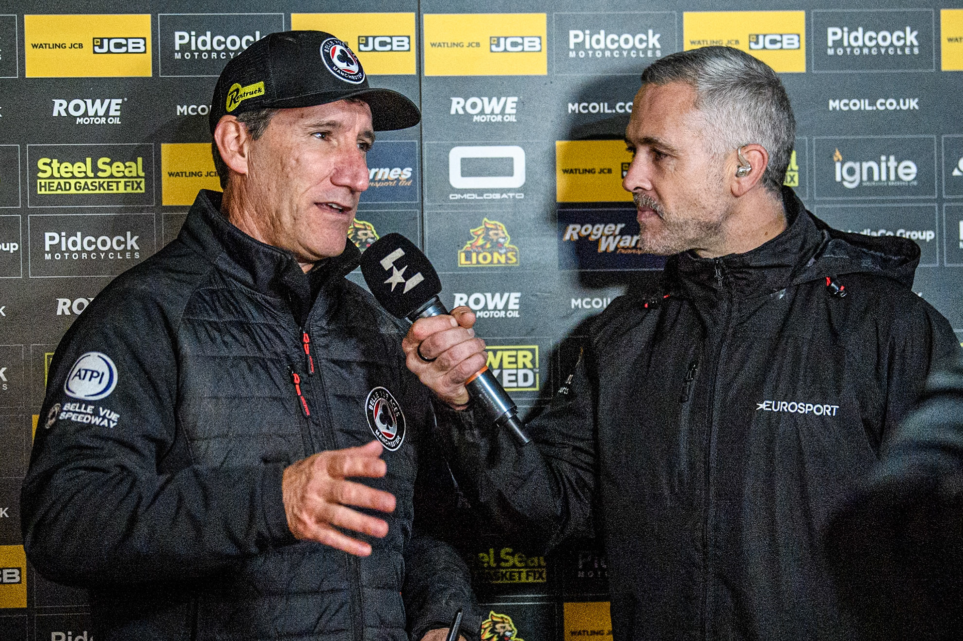 Belle Vue Aces' Team Manager Mark Lemon (Left) is interviewed by Scott Nicholls during the Rowe Motor Oil Premiership Grand Final 2nd Leg between Leicester Lions and Belle Vue Aces at the Pidcock Motorcycles Arena, Leicester on Thursday 26th September 2024. (Photo: Ian Charles | MI News)