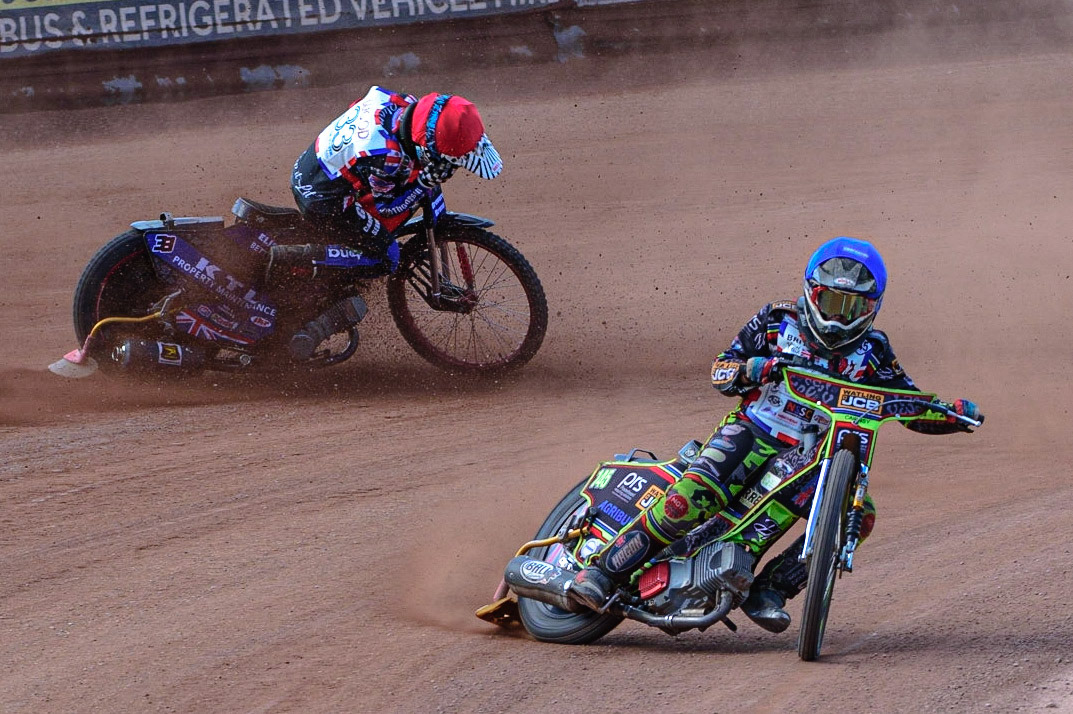 MANCHESTER, UK. JUN 3RD Charlie Wood (33) (Red) crashes behind William Cairns (145)  (Blue) during the British Youth Speedway Championship (Round 4)  at the National Speedway Stadium, Manchester on Friday 3rd June 2022. (Credit: Ian Charles | MI News)