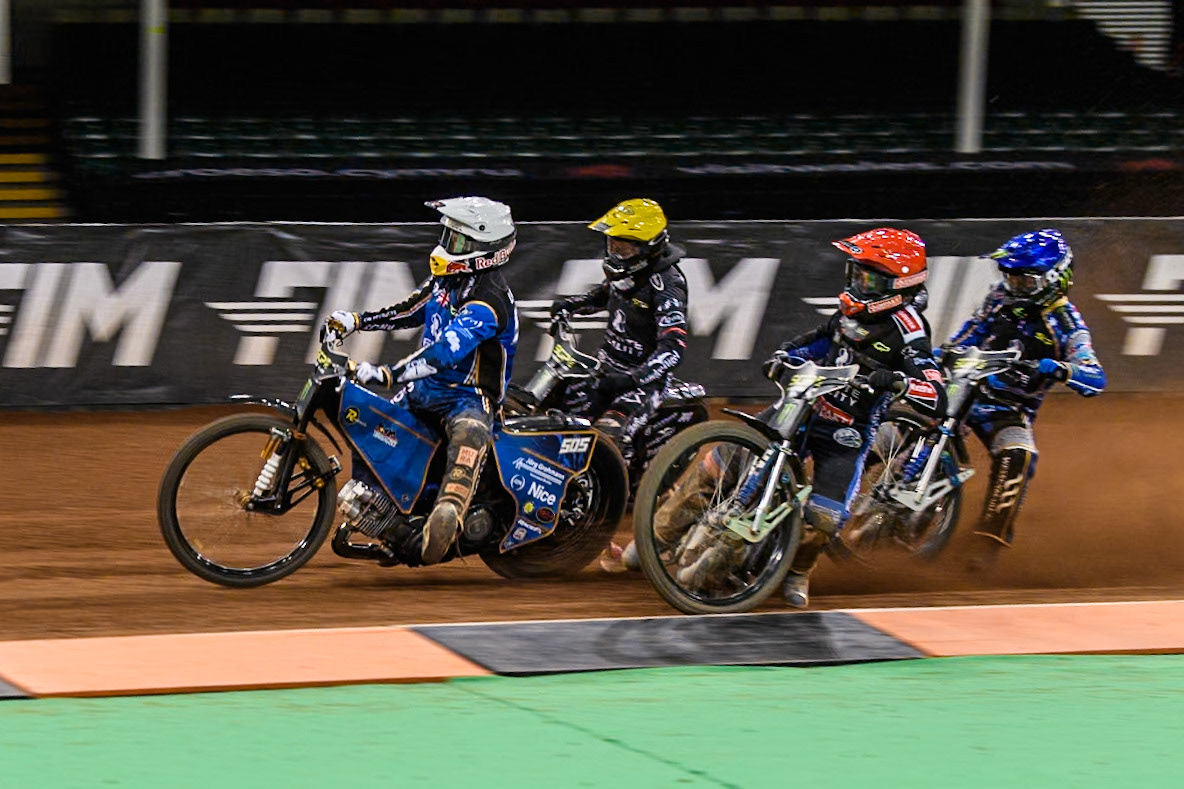 Robert Lambert (505) of Great Britain in White leading Leon Madsen (30) of Denmark in Red, Kai Huckenbeck (744) of Germany in Yellow with Jack Holder (25) of Australia in Blue behind during the FIM Speedway Grand Prix of Great Britain at The Principality Stadium, Cardiff on Saturday 17th August 2024. (Photo: Ian Charles | MI News)