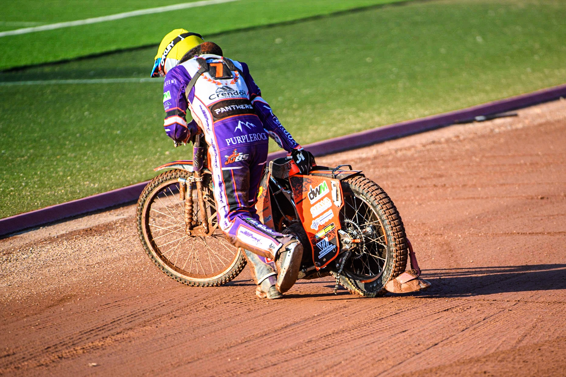 Jordan Jenkins pulls his bike from the track after shedding his chain and jamming the back wheel during the Sports Insure Premiership match between Belle Vue Aces and Peterborough at the National Speedway Stadium, Manchester on Monday 19th June 2023. (Photo: Ian Charles | MI News)