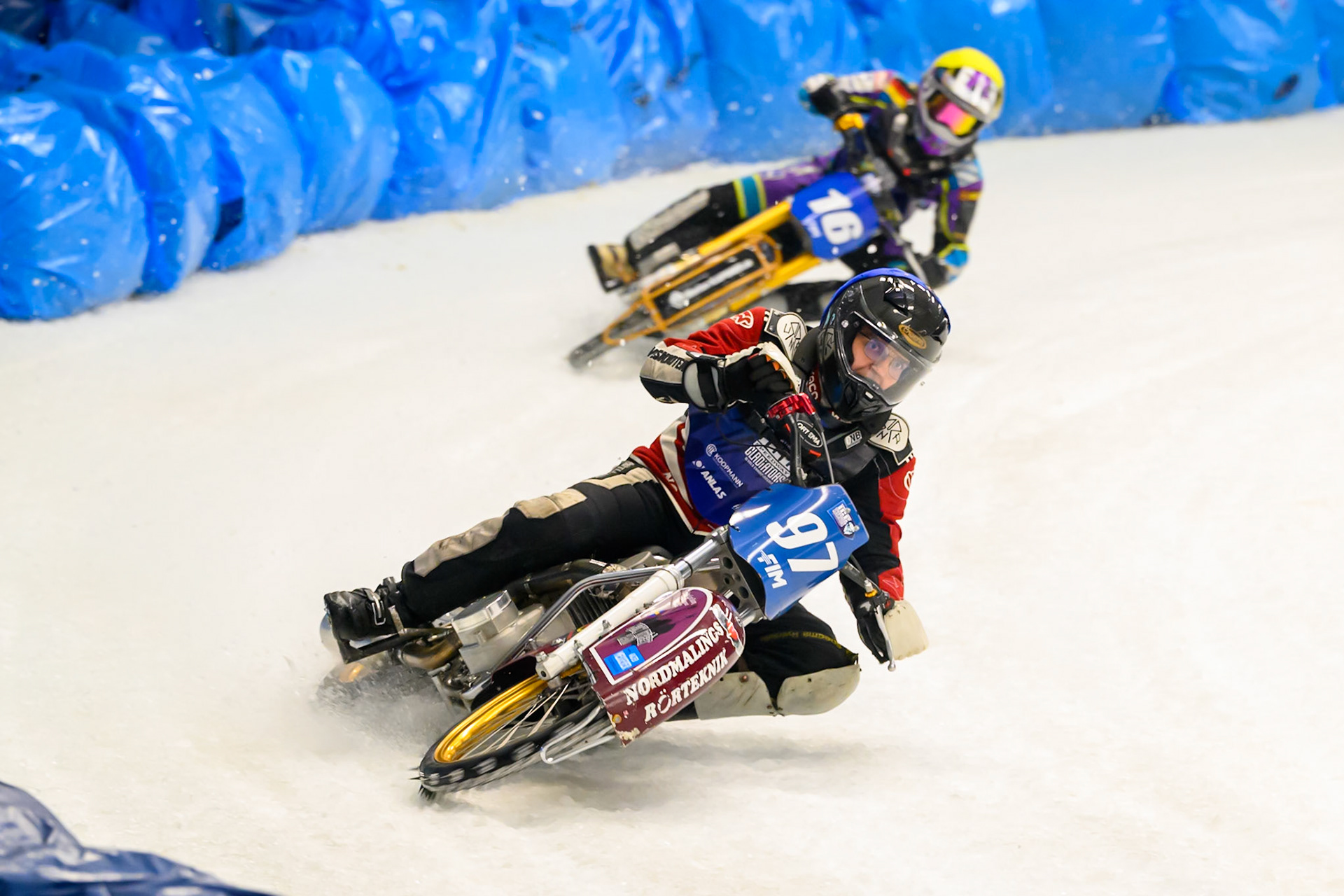 Ove Ledström (97) of Sweden in Blue leading Wild Card Maximillian Niedermaier of Germany in Yellow during the Ice Speedway Gladiators World Championship Final 2 at Max-Aicher-Arena, Inzell on Sunday 15th March 2026. (Photo: Ian Charles | MI News)