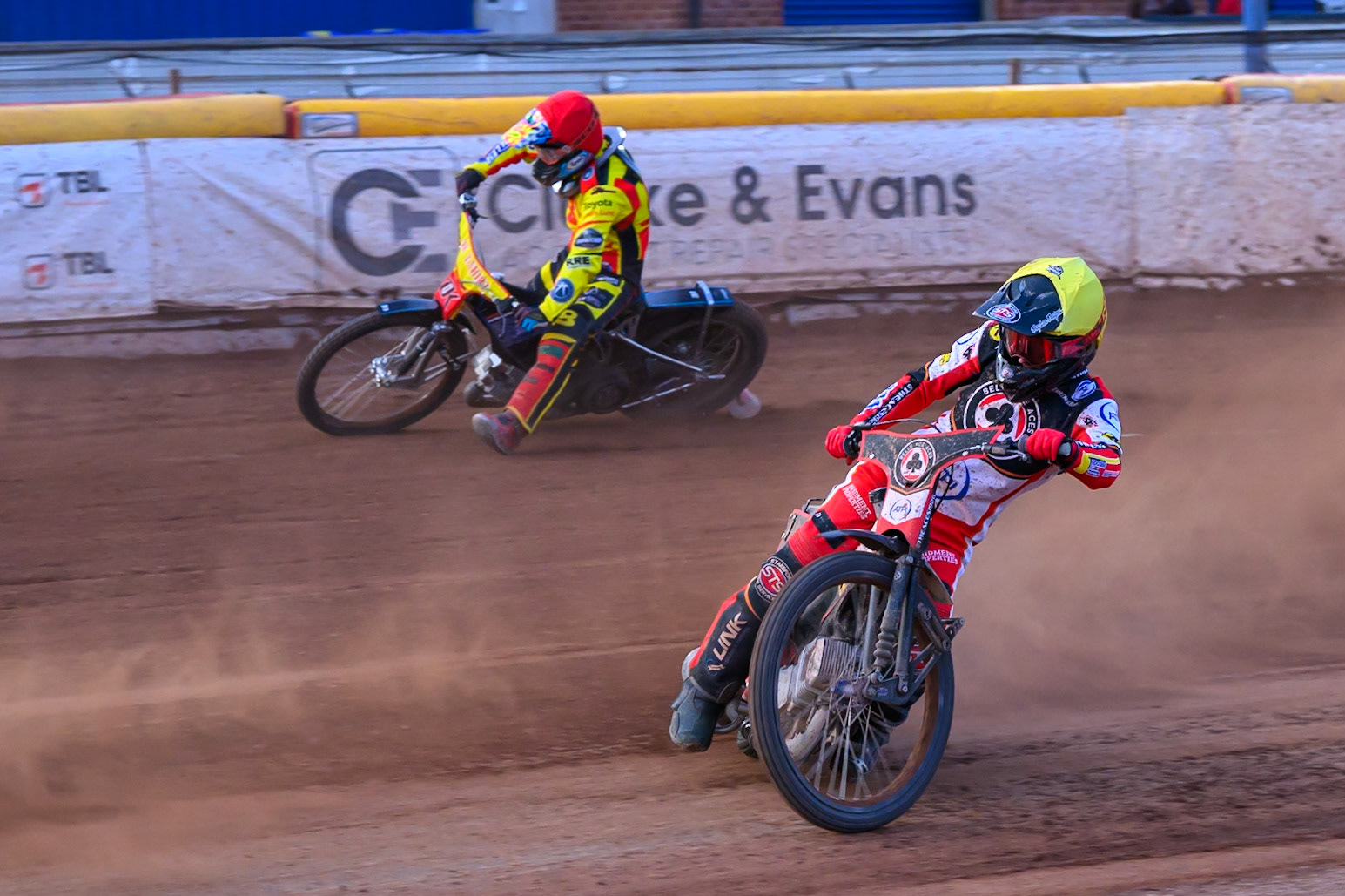 Belle Vue Aces' Zach Cook in Yellow passes Birmingham Brummies' Jonas Jeppesen in Red as he pulls up with bike problems during the Rowe Motor Oil Premiership match between Birmingham Brummies and Belle Vue Aces at Perry Bar Stadium, Birmingham on Monday 2nd June 2025. (Photo: Ian Charles | MI News)