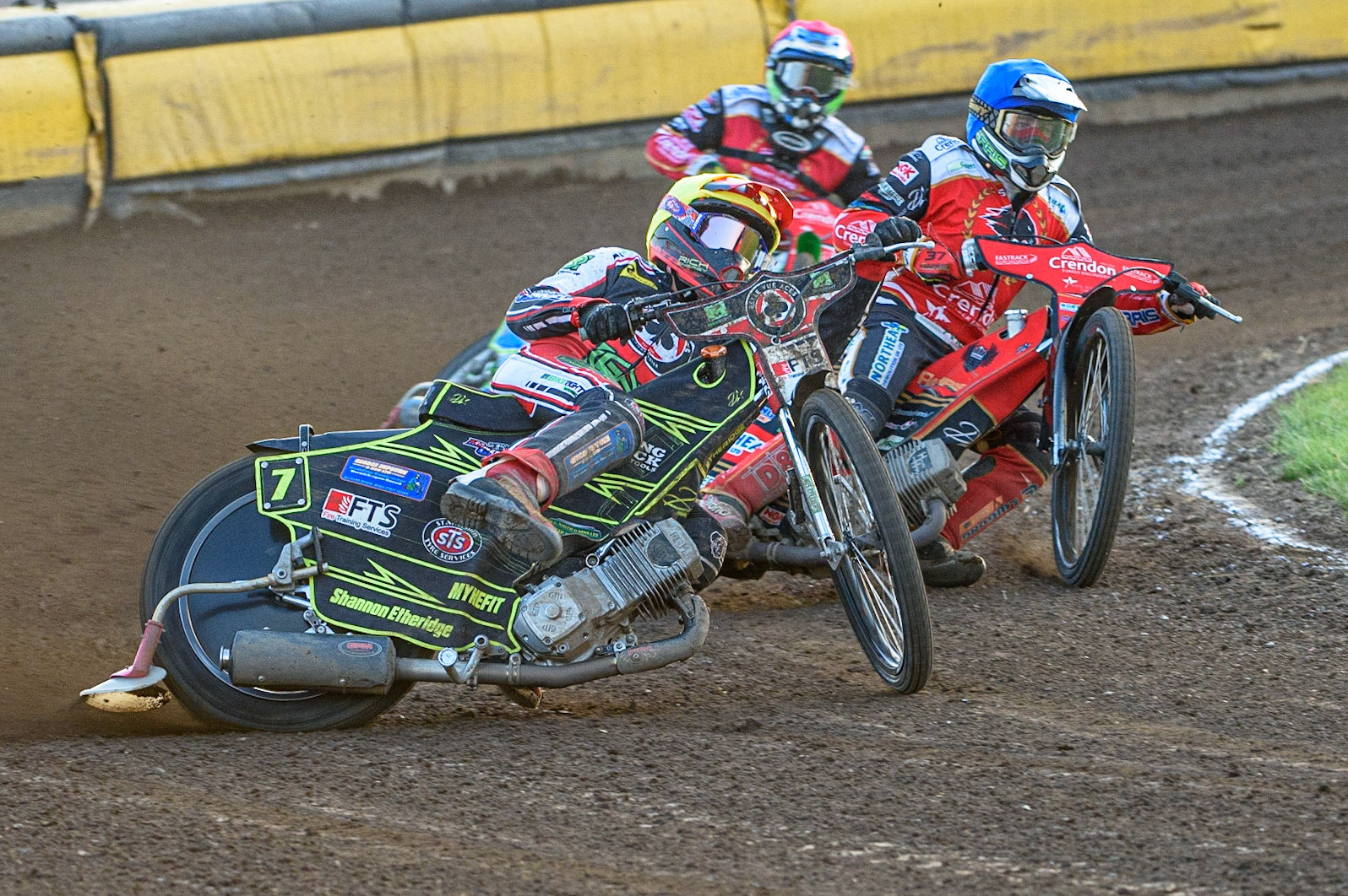 PETERBOROUGH, UK. JULY 19TH   Jye Etheridge  (Yellow) leads Chris Harris  (Blue) and Hans Andersen  (Red)during the SGB Premiership match between Peterborough and Belle Vue Aces at East of England Showground, Peterborough on Monday 19th July 2021. (Credit: Ian Charles | MI News)