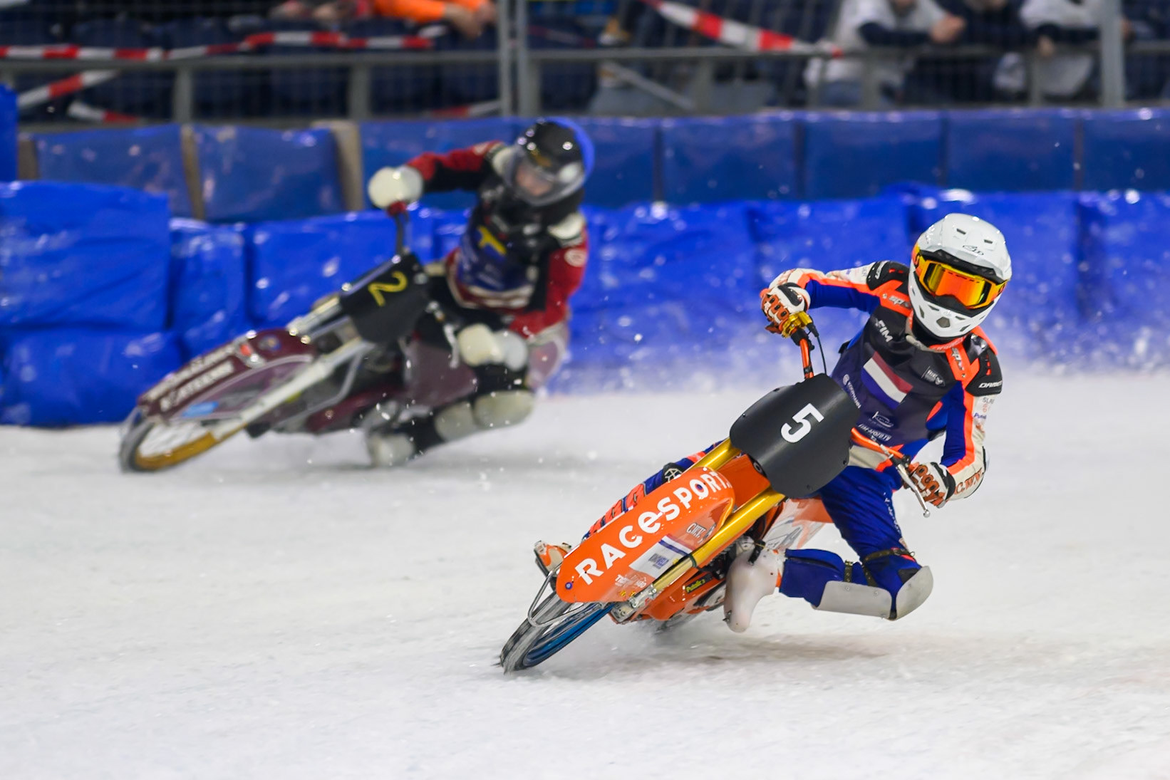 Jasper Iwema (5) of The Netherlands  in White rides inside Ove Ledstrom (2) of Sweden  in Blue during the FIM Ice Speedway Of Nations at Ice Rink Thialf, Heerenveen on Sunday 12th April 2026. (Photo: Ian Charles | MI News)