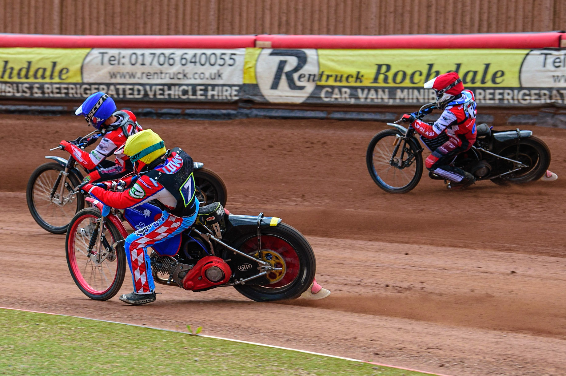 MANCHESTER, UK.  JUN 3RD  Jacob Fellows  (Yellow) chases Freddy Hodder  (Blue) with Sam McGurk (Red) on the outside during the National Development League match between Belle Vue Colts and Oxford Chargers at the National Speedway Stadium, Manchester on Friday 3rd June 2022. (Credit: Ian Charles | MI News)