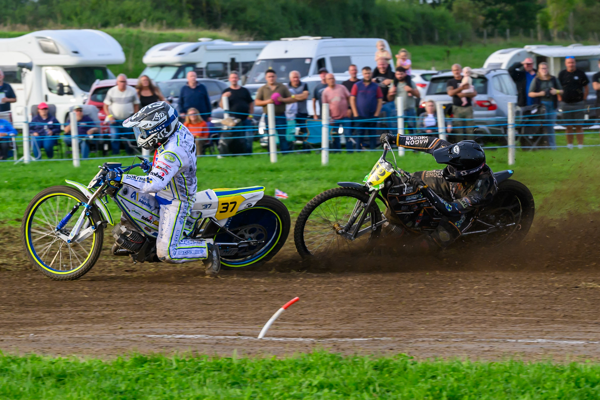 British Masters (Solos): Ashton Vale (152) catches the back wheel of Chris Harris (37)  and comes off during the British Masters Grasstrack Championship at Lower Marsh Farm, Much Hoole, Preston in Lancashire, England on Sunday 13th September 2026. (Photo: Ian Charles | MI News)