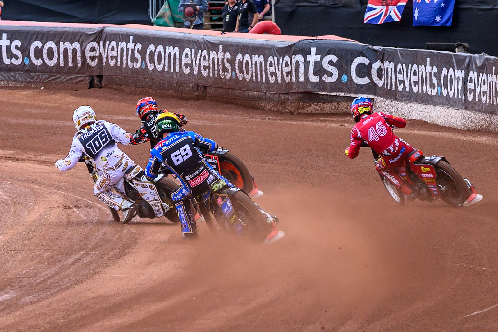 Jason Doyle (69) of Australia in Yellow chases Max Fricke (46) of Australia in Blue, Anders Thomsen (105) of Denmark in White and January Kvech (201) of Czech Republic in Red during the ATPI FIM Speedway Grand Prix Round 4 at the National Speedway Stadium, Manchester, on Friday 13th June 2025. (Photo: Ian Charles | MI News)
