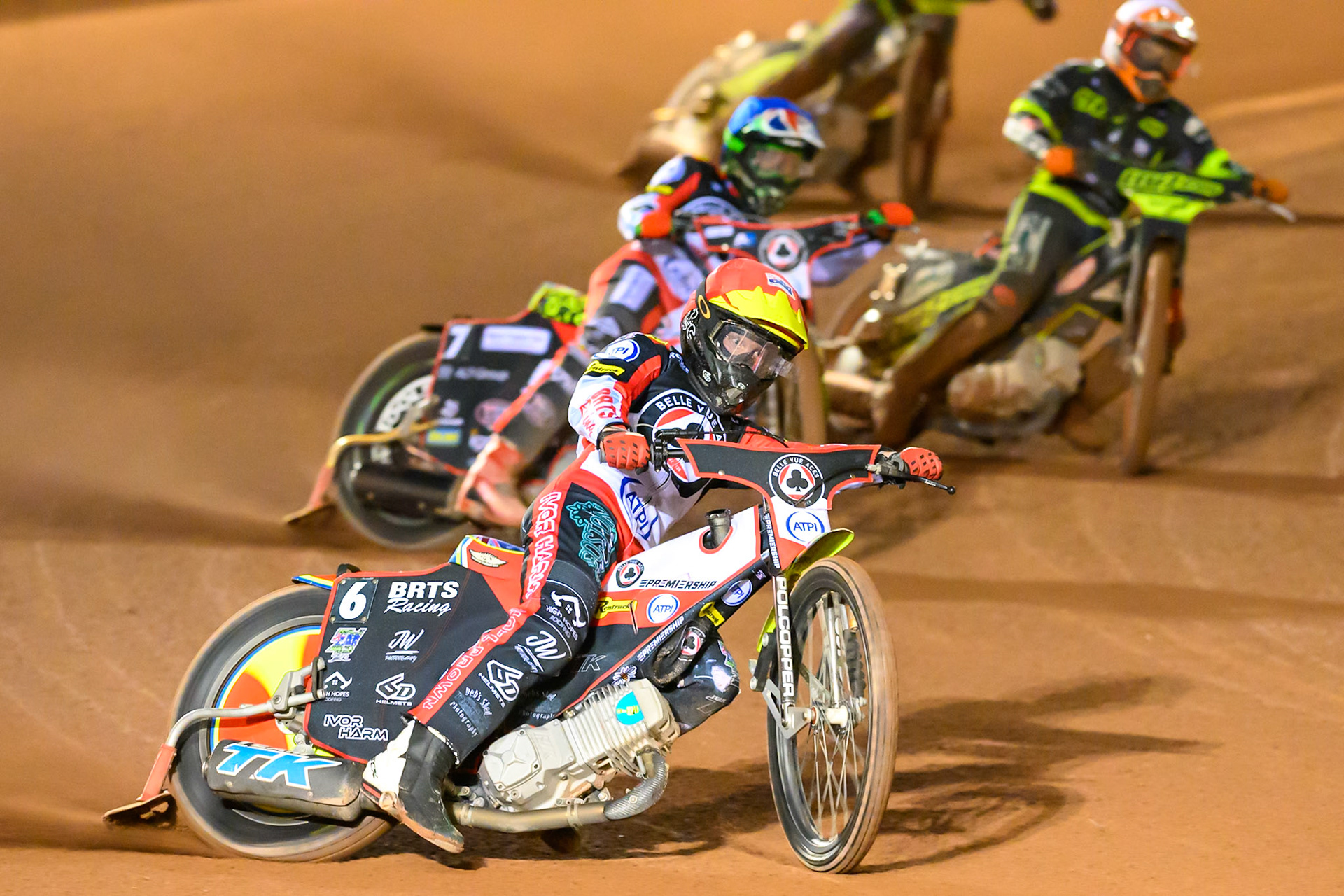 Tate Zischke of Belle Vue Aces  in Red leading William Cairns of Belle Vue Aces in Blue  and Kevin Juul Pedersen of Ipswich Witches in White during the Rowe Motor Oil Premiership Play Off Semi Final 2nd leg match between Belle Vue Aces and Ipswich Witches at the National Speedway Stadium, Manchester on Monday 28th September 2026. (Photo: Ian Charles | MI News)