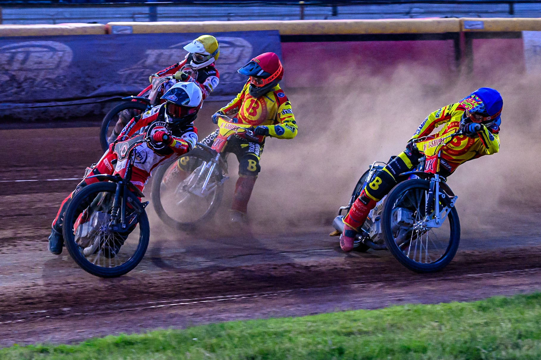 Belle Vue Aces' Zach Cook in White leading Birmingham Brummies' Jonas Jeppesen in Blue Birmingham Brummies' Jason Edwards in Red and Belle Vue Aces' Jake Mulford in Yellow during the Rowe Motor Oil Premiership match between Birmingham Brummies and Belle Vue Aces at Perry Bar Stadium, Birmingham on Monday 2nd June 2025. (Photo: Ian Charles | MI News)