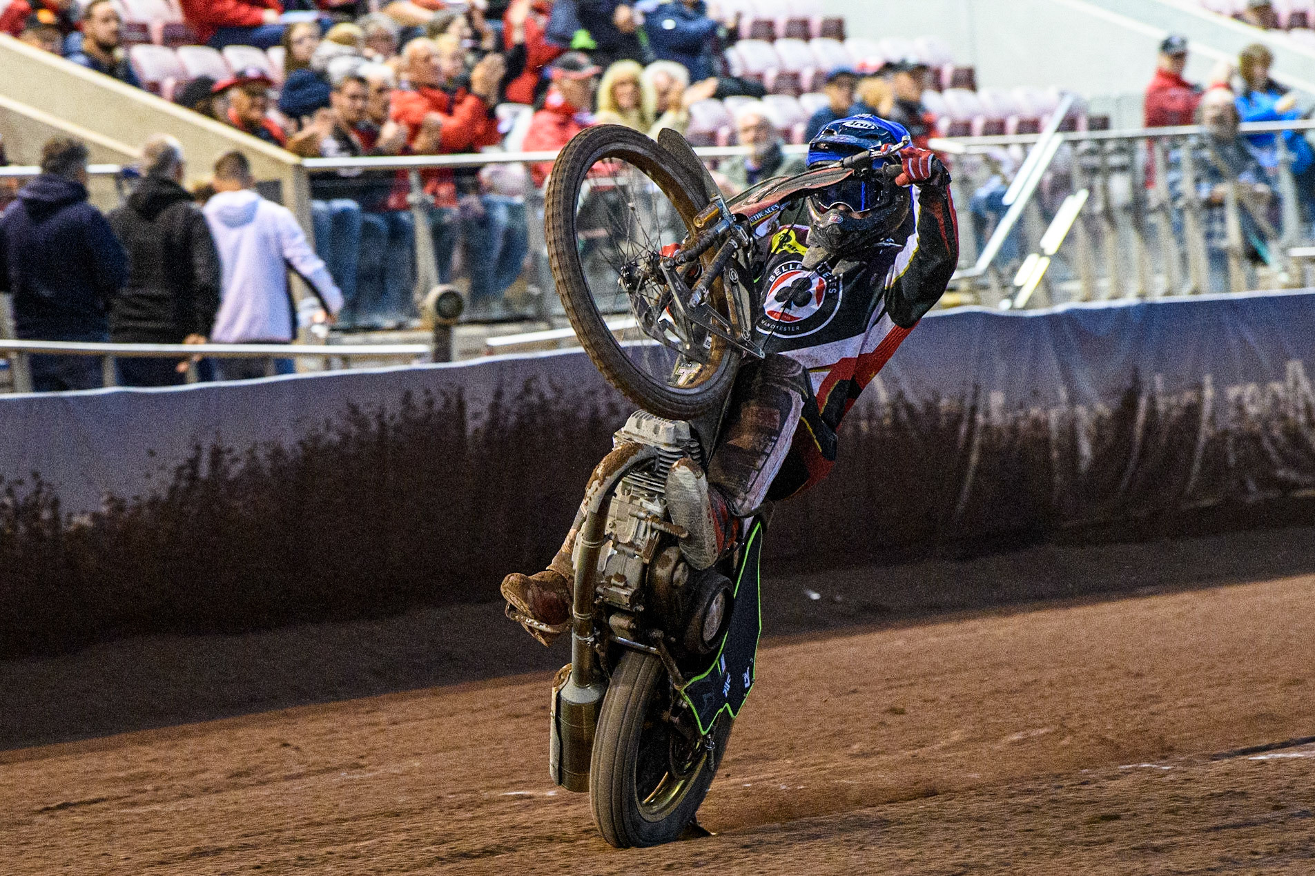 Tom Brennan celebrates with a wheelie during the Sports Insure Premiership match between Belle Vue Aces and Ipswich Witches at the National Speedway Stadium, Manchester on Monday 17th July 2023. (Photo: Ian Charles | MI News)
