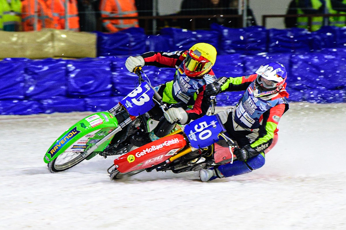 HEERENVEEN, NL.  Harald Simon (50) (Blue) forces his way past Johann Weber (33)  (Yellow) during the FIM Ice Speedway Gladiators World Championship Final 4 at Ice Rink Thialf, Heerenveen on Sunday  3 April 2022. (Credit: Ian Charles | MI News)