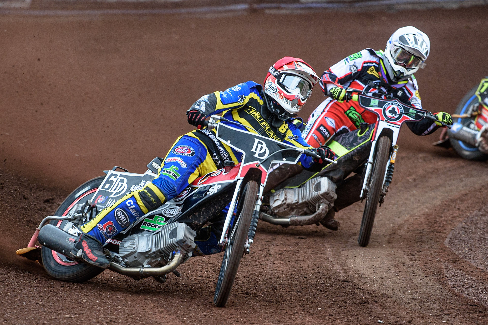 SHEFFIELD, UK. JULY 1ST     James Wright  (Red) leads Tom Brennan  (White) during the SGB Premiership match between Sheffield Tigers and Belle Vue Aces at Owlerton Stadium, Sheffield on Thursday 1st July 2021. (Credit: Ian Charles | MI News)